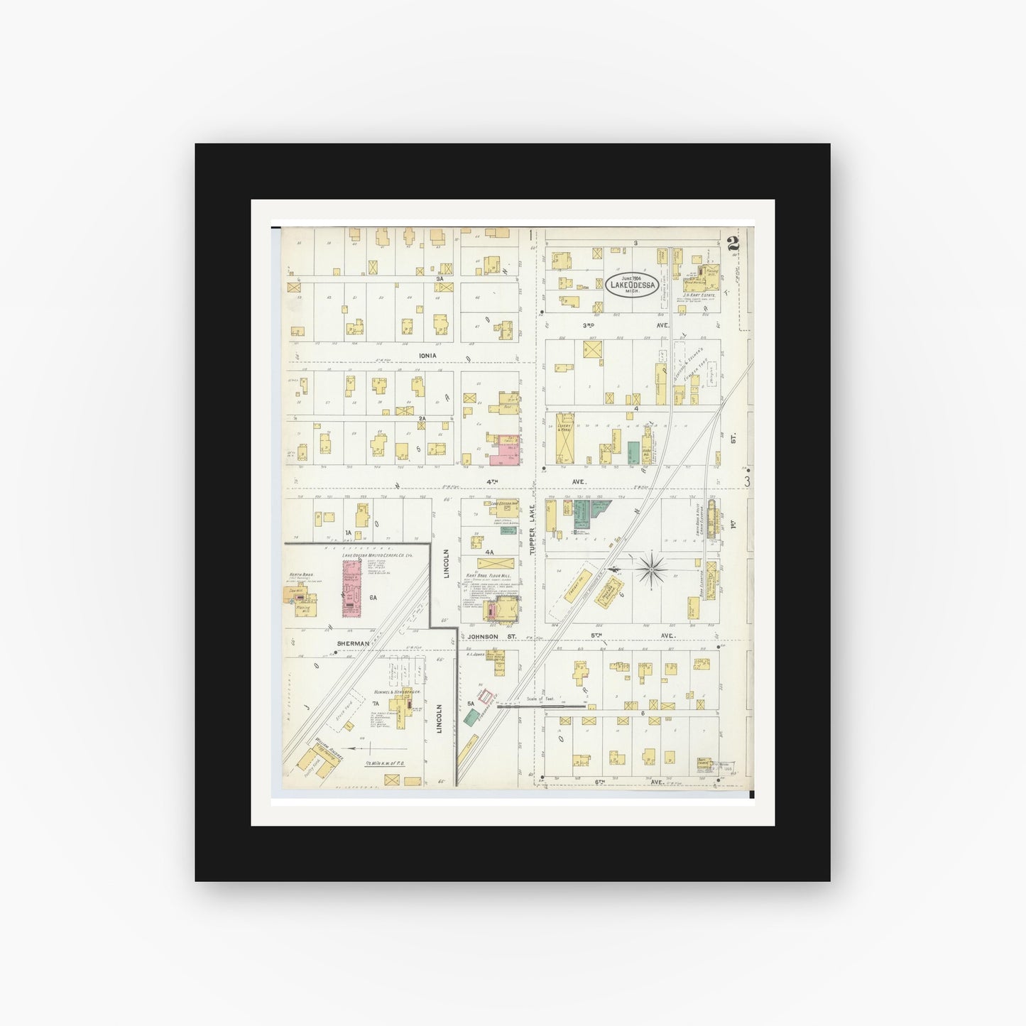 Old map wall art mockup — black gallery frame with white mat — Sanborn Fire Insurance Map from Lake Odessa, Ionia County, Michigan (1904), Sheet #0002
