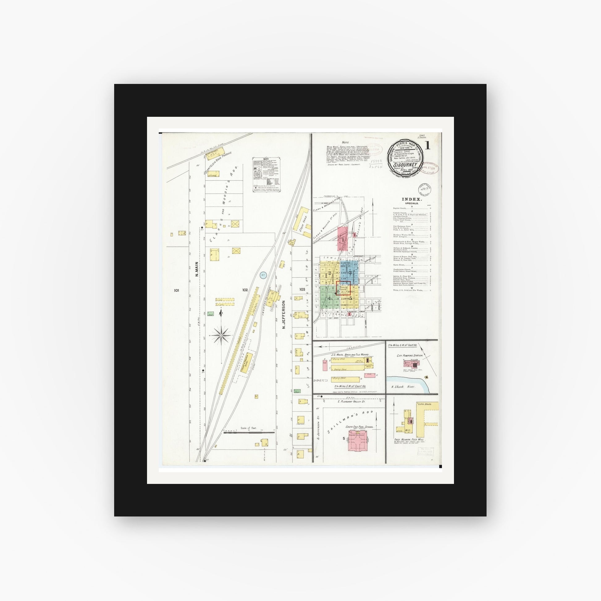 Old map wall art mockup — black gallery frame with white mat — Sanborn Fire Insurance Map from Sigourney, Kiokuk County, Iowa (1899), Sheet #0001