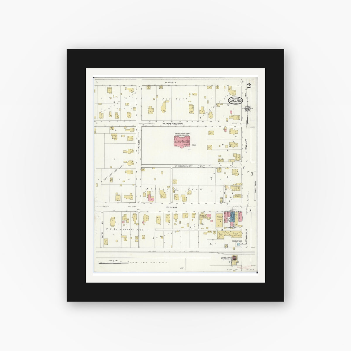 Old map wall art mockup — black gallery frame with white mat — Sanborn Fire Insurance Map from Oakland, Coles County, Illinois (1916), Sheet #0002