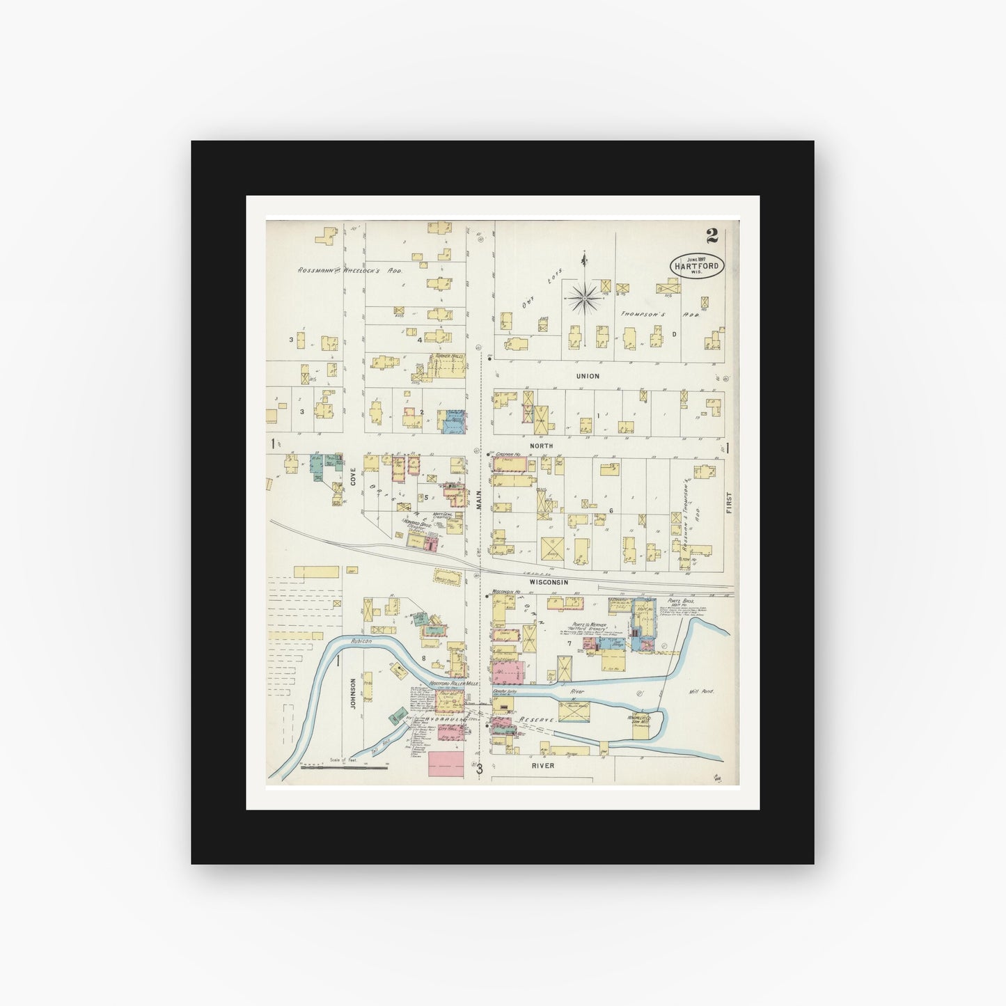 Old map wall art mockup — black gallery frame with white mat — Sanborn Fire Insurance Map from Hartford, Washington County, Wisconsin (1897), Sheet #0002