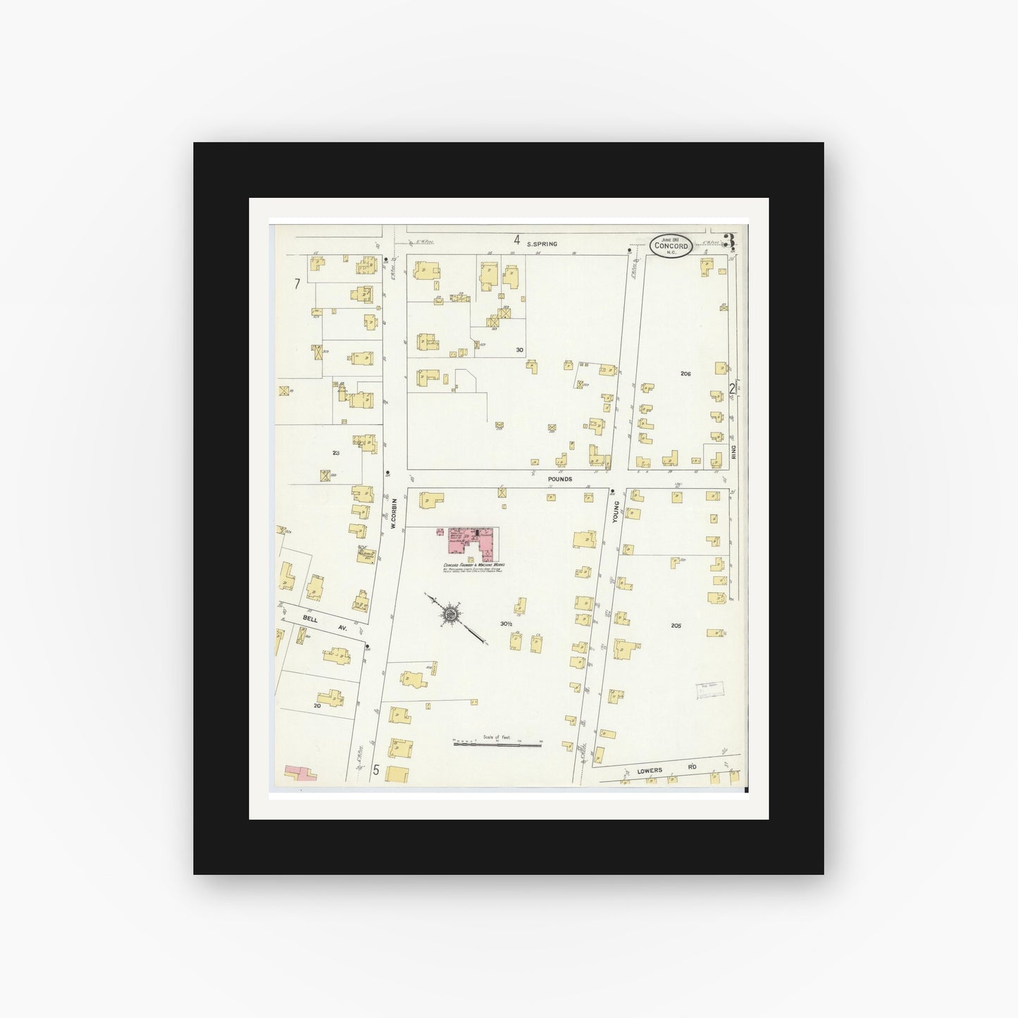 Old map wall art mockup — black gallery frame with white mat — Sanborn Fire Insurance Map from Concord, Cabarrus County, North Carolina (1911), Sheet #0003