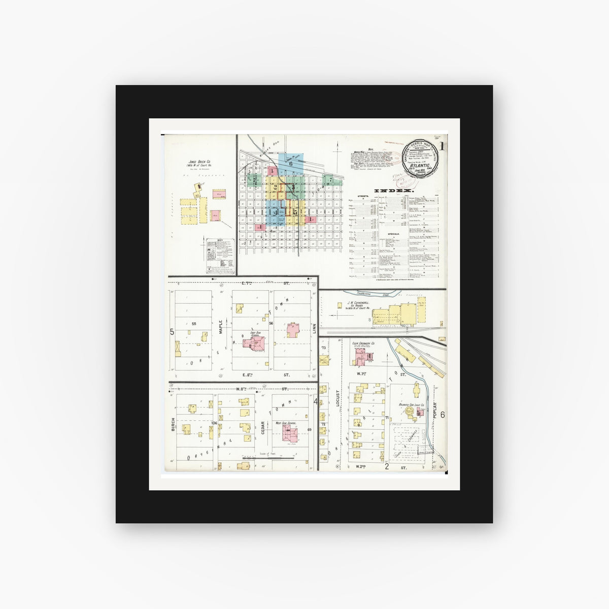 Old map wall art mockup — black gallery frame with white mat — Sanborn Fire Insurance Map from Atlantic, Cass County, Iowa (1899) â€” Complete Set