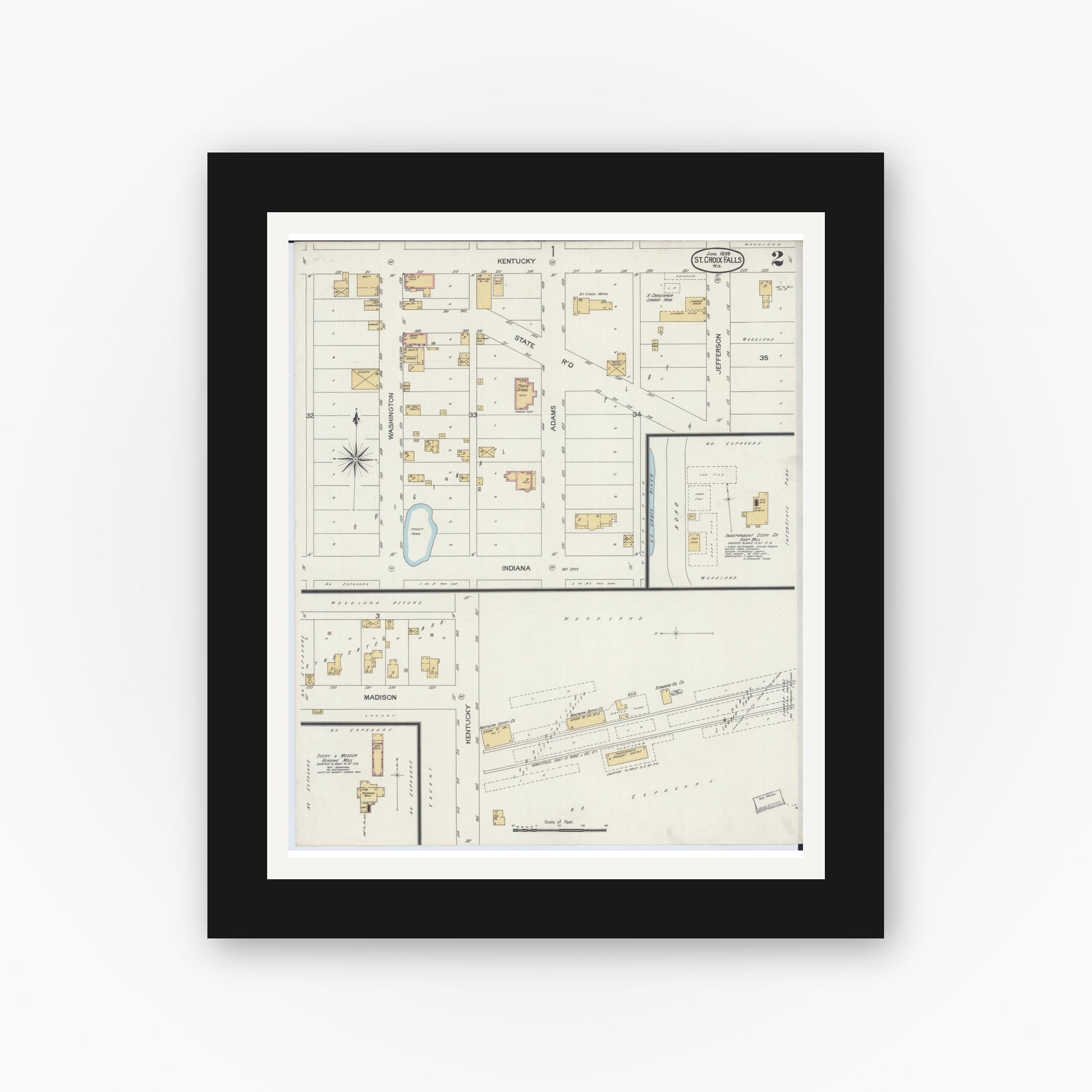 Old map wall art mockup — black gallery frame with white mat — Sanborn Fire Insurance Map from Saint Croix Falls, Polk County, Wisconsin (1899), Sheet #0002