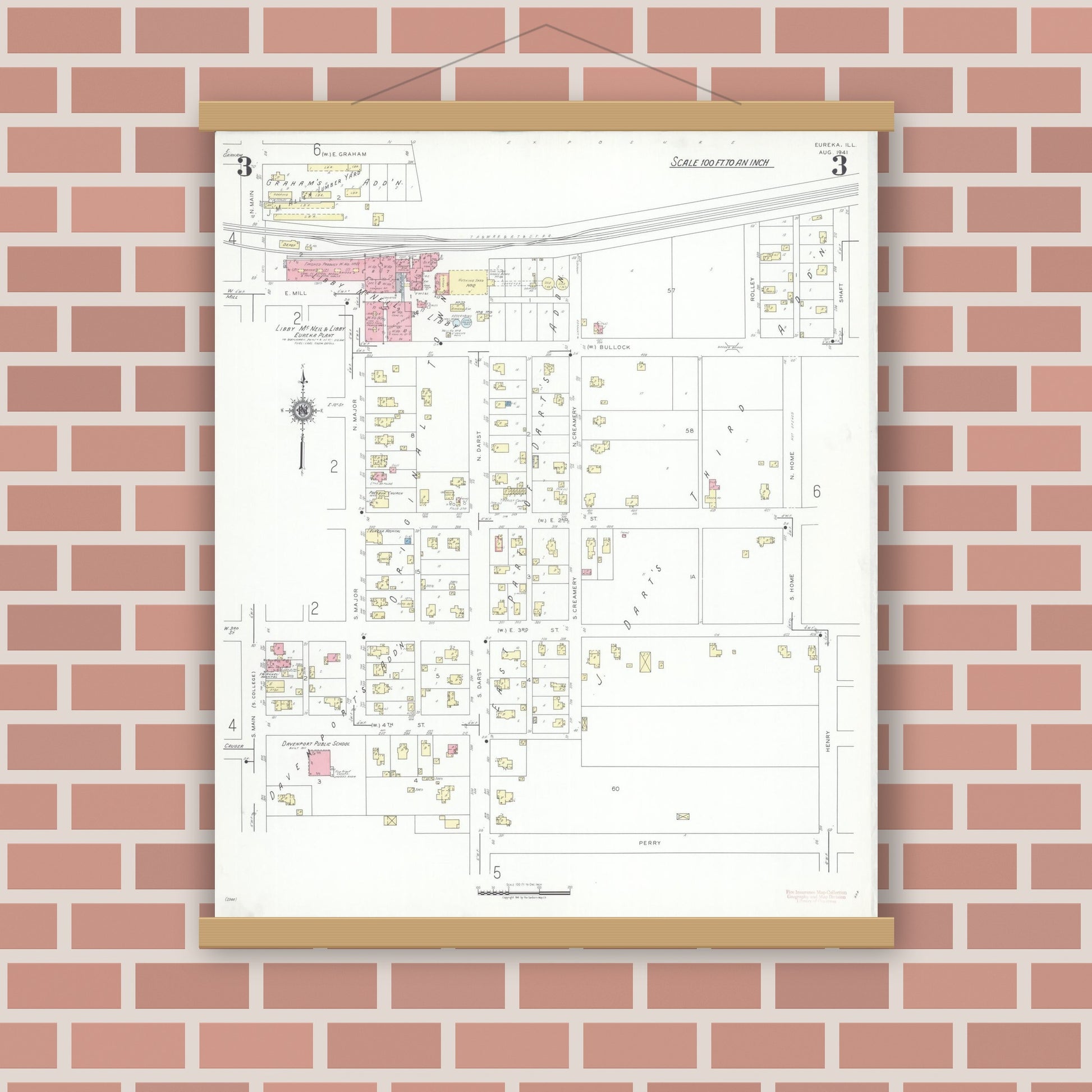 Old map wall art mockup — magnetic wood frame on brick wall — Sanborn Fire Insurance Map from Eureka, Woodford County, Illinois (1941), Sheet #0003