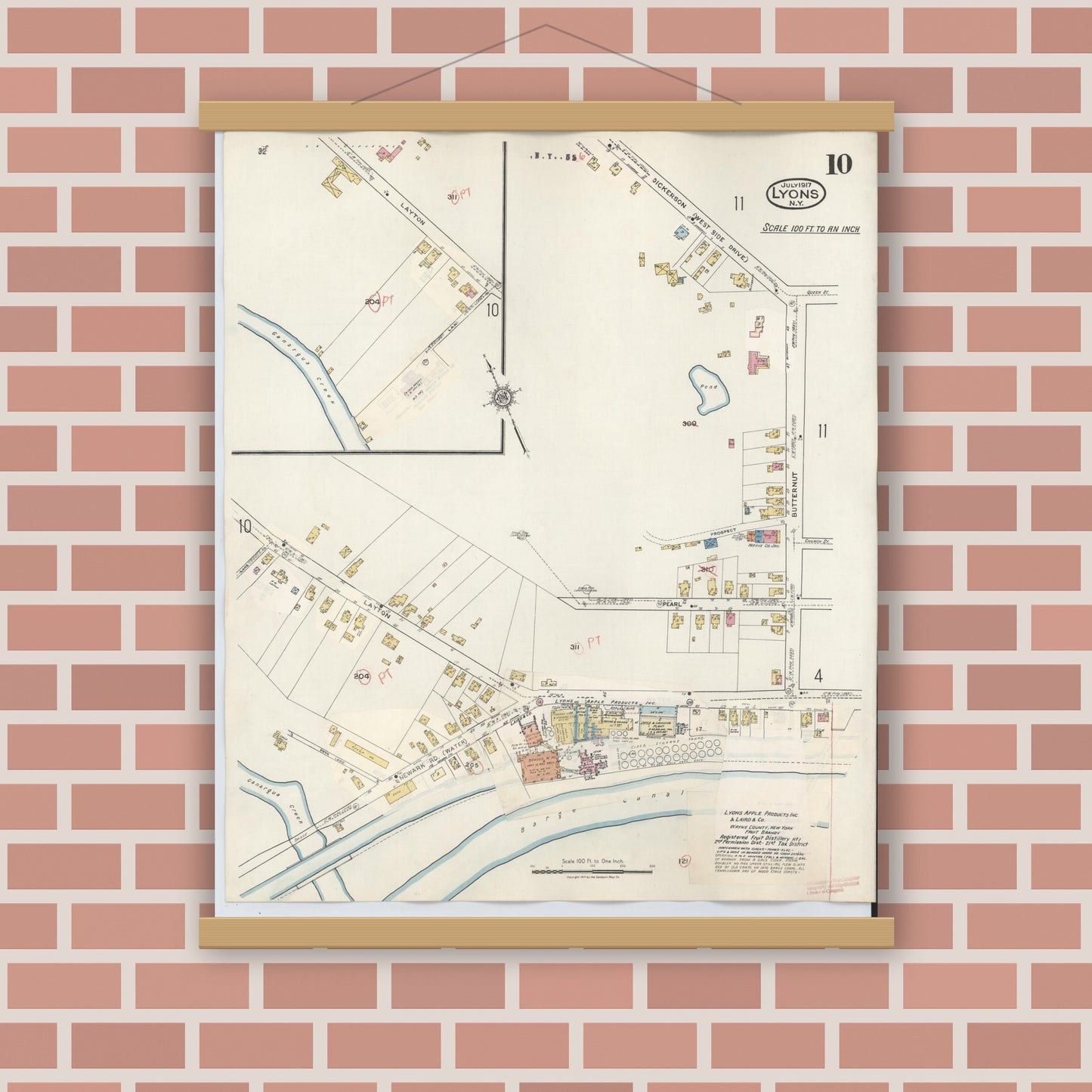 Old map wall art mockup — magnetic wood frame on brick wall — Sanborn Fire Insurance Map from Lyons, Wayne County, New York (1949), Sheet #0010