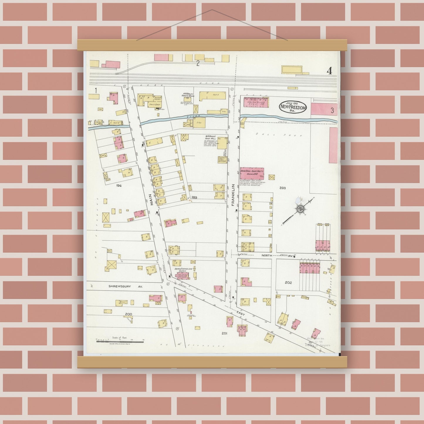 Old map wall art mockup — magnetic wood frame on brick wall — Sanborn Fire Insurance Map from New Freedom, York County, Pennsylvania (1919), Sheet #0004