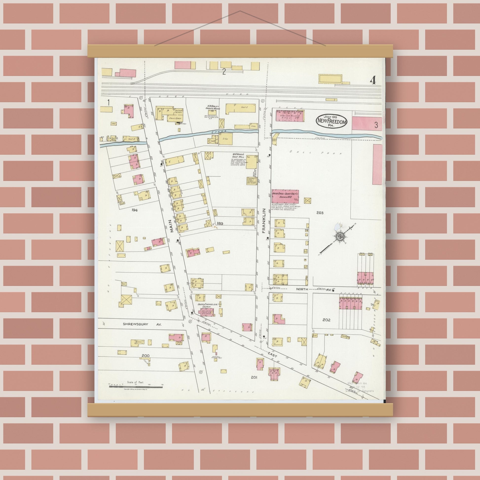 Old map wall art mockup — magnetic wood frame on brick wall — Sanborn Fire Insurance Map from New Freedom, York County, Pennsylvania (1919), Sheet #0004