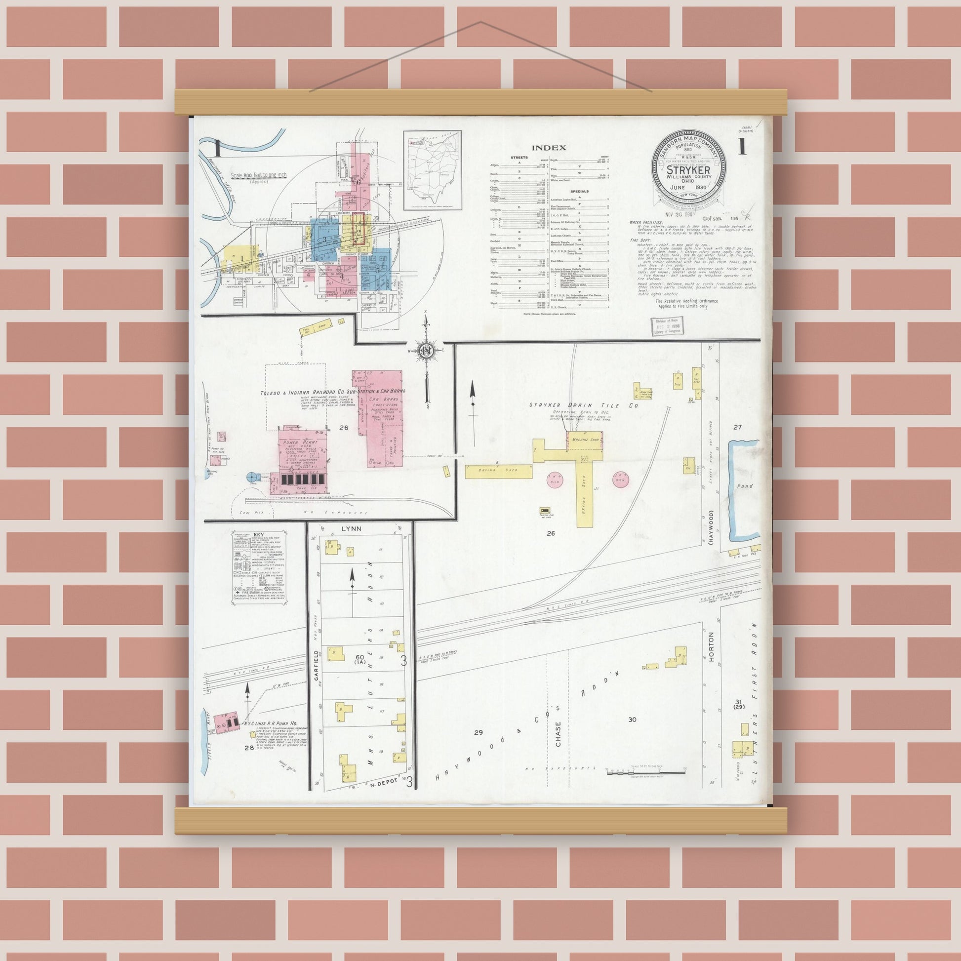Old map wall art mockup — magnetic wood frame on brick wall — Sanborn Fire Insurance Map from Stryker, Williams County, Ohio (1930), Sheet #0001