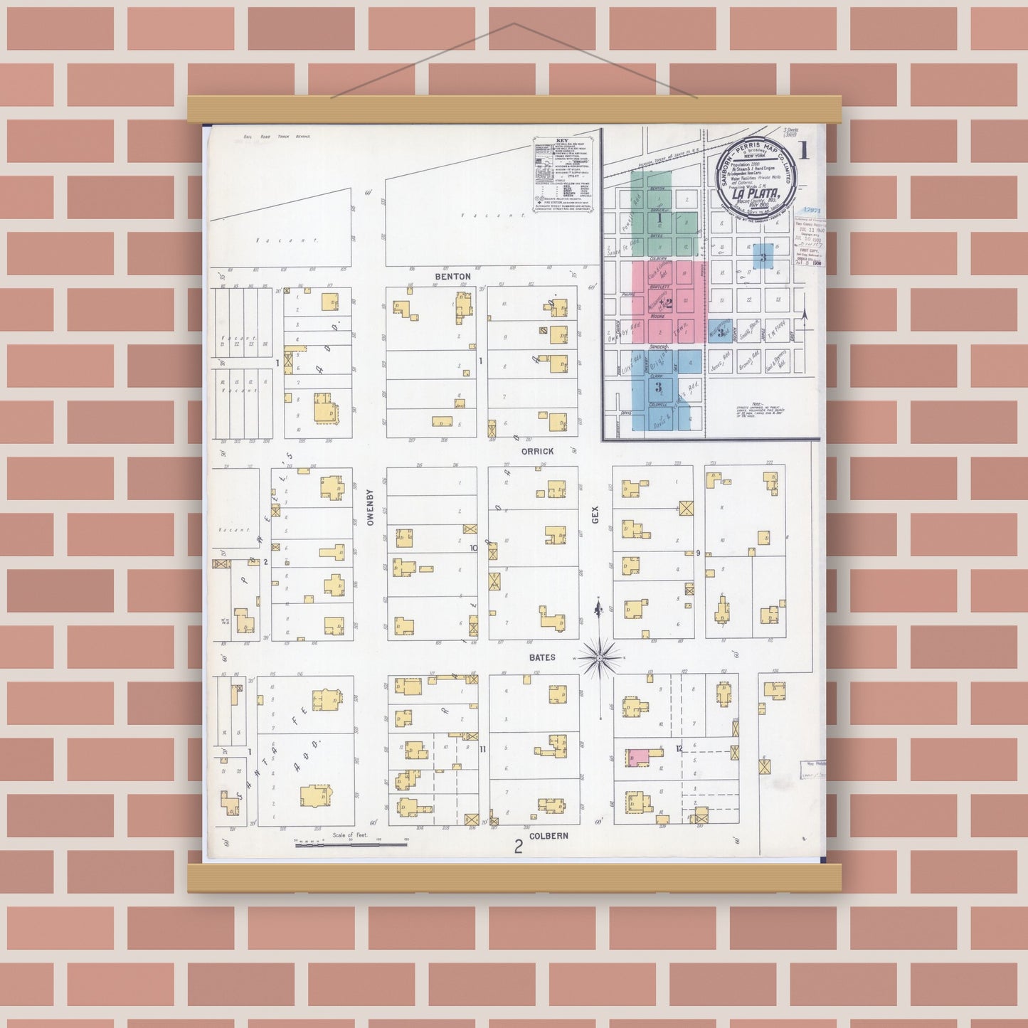 Old map wall art mockup — magnetic wood frame on brick wall — Sanborn Fire Insurance Map from La Plata, Macon County, Missouri (1900) - Complete Map Set