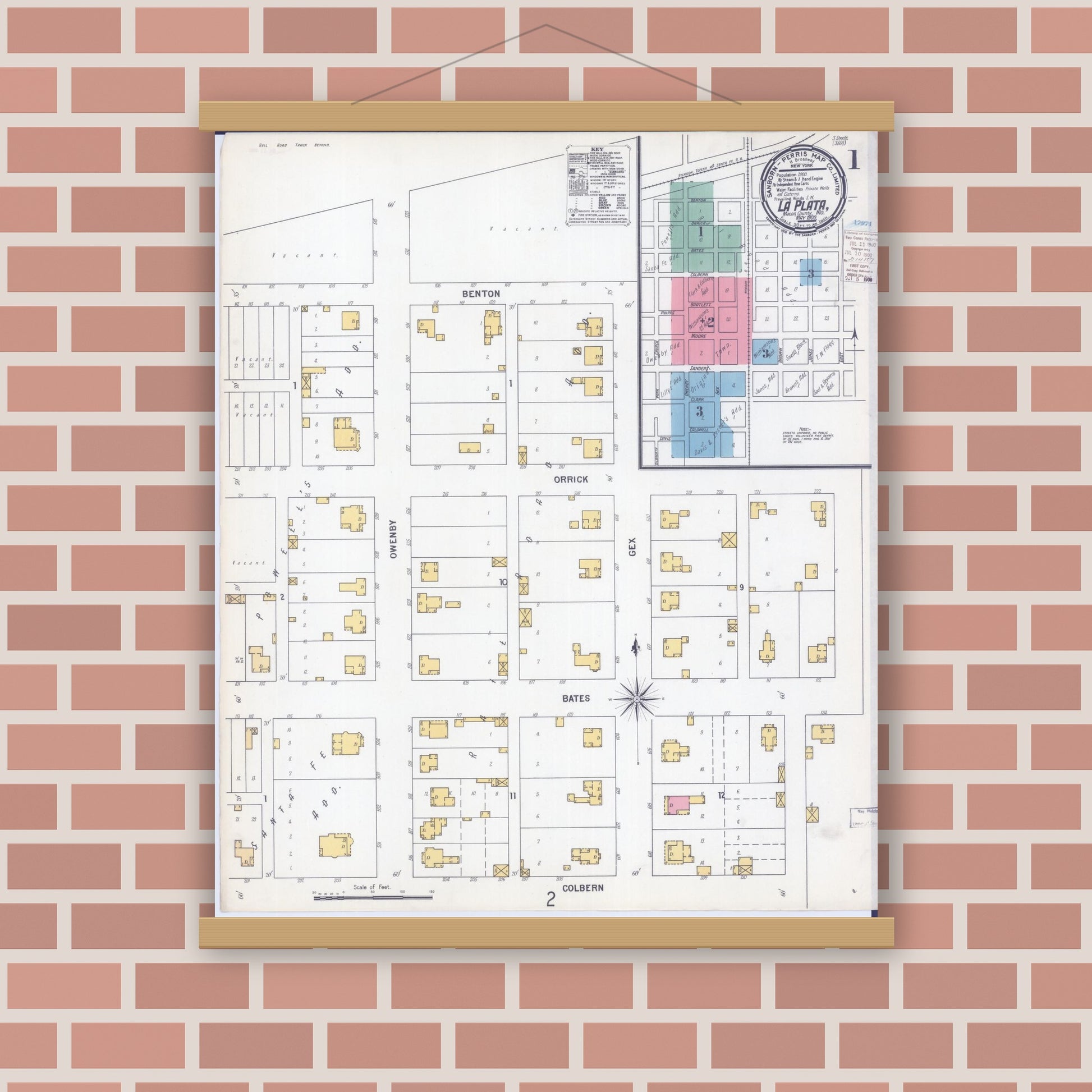 Old map wall art mockup — magnetic wood frame on brick wall — Sanborn Fire Insurance Map from La Plata, Macon County, Missouri (1900) - Complete Map Set