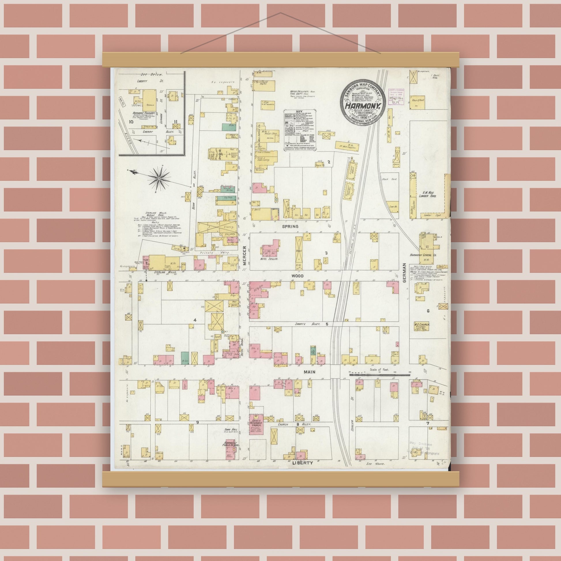 Old map wall art mockup — magnetic wood frame on brick wall — Sanborn Fire Insurance Map from Harmony, Butler County, Pennsylvania (1906), Sheet #0001