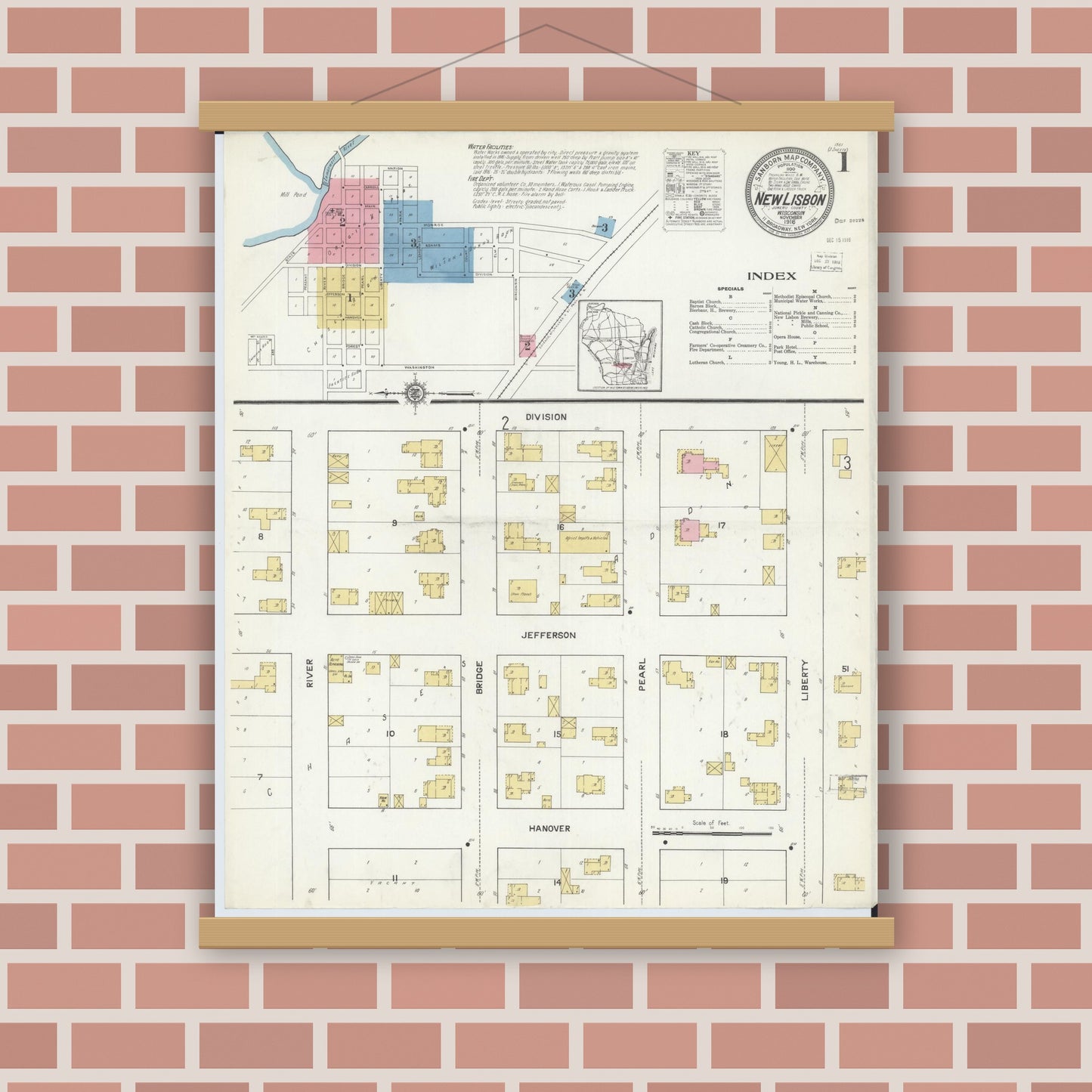 Old map wall art mockup — magnetic wood frame on brick wall — Sanborn Fire Insurance Map from New Lisbon, Juneau County, Wisconsin (1916), Sheet #0001