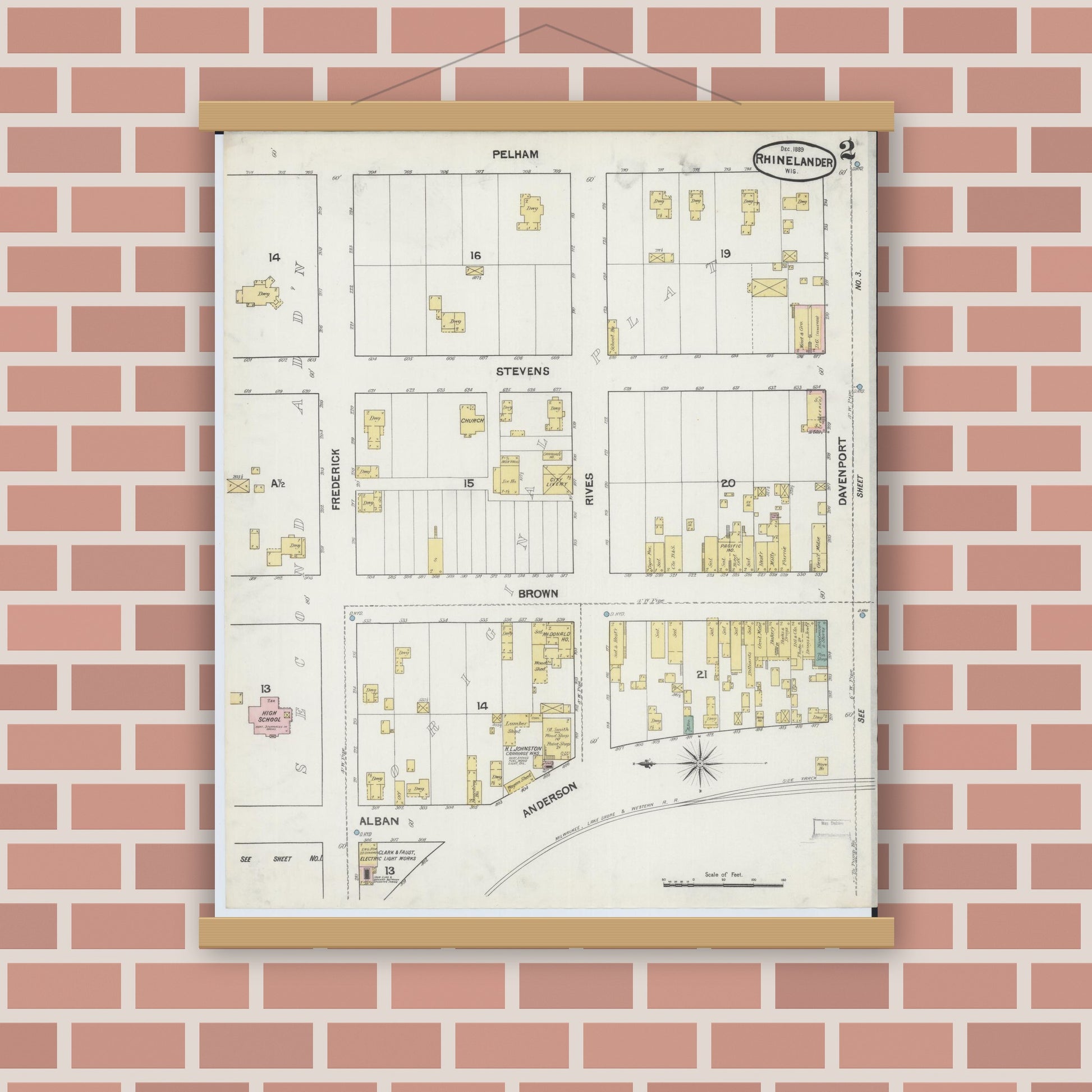 Old map wall art mockup — magnetic wood frame on brick wall — Sanborn Fire Insurance Map from Rhinelander, Oneida County, Wisconsin (1889), Sheet #0002