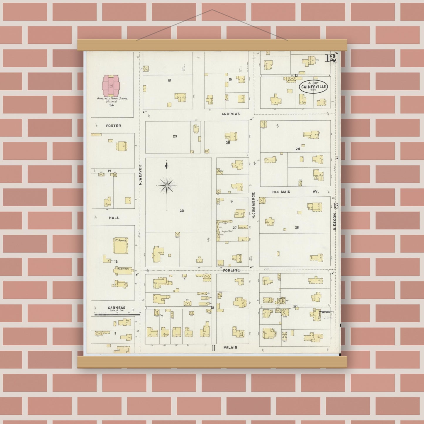 Old map wall art mockup — magnetic wood frame on brick wall — Sanborn Fire Insurance Map from Gainesville, Cooke County, Texas (1897), Sheet #0012
