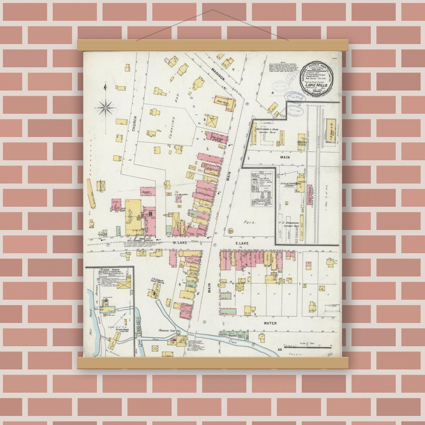 Old map wall art mockup — magnetic wood frame on brick wall — Sanborn Fire Insurance Map from Lake Mills, Jefferson County, Wisconsin (1898), Sheet #0001
