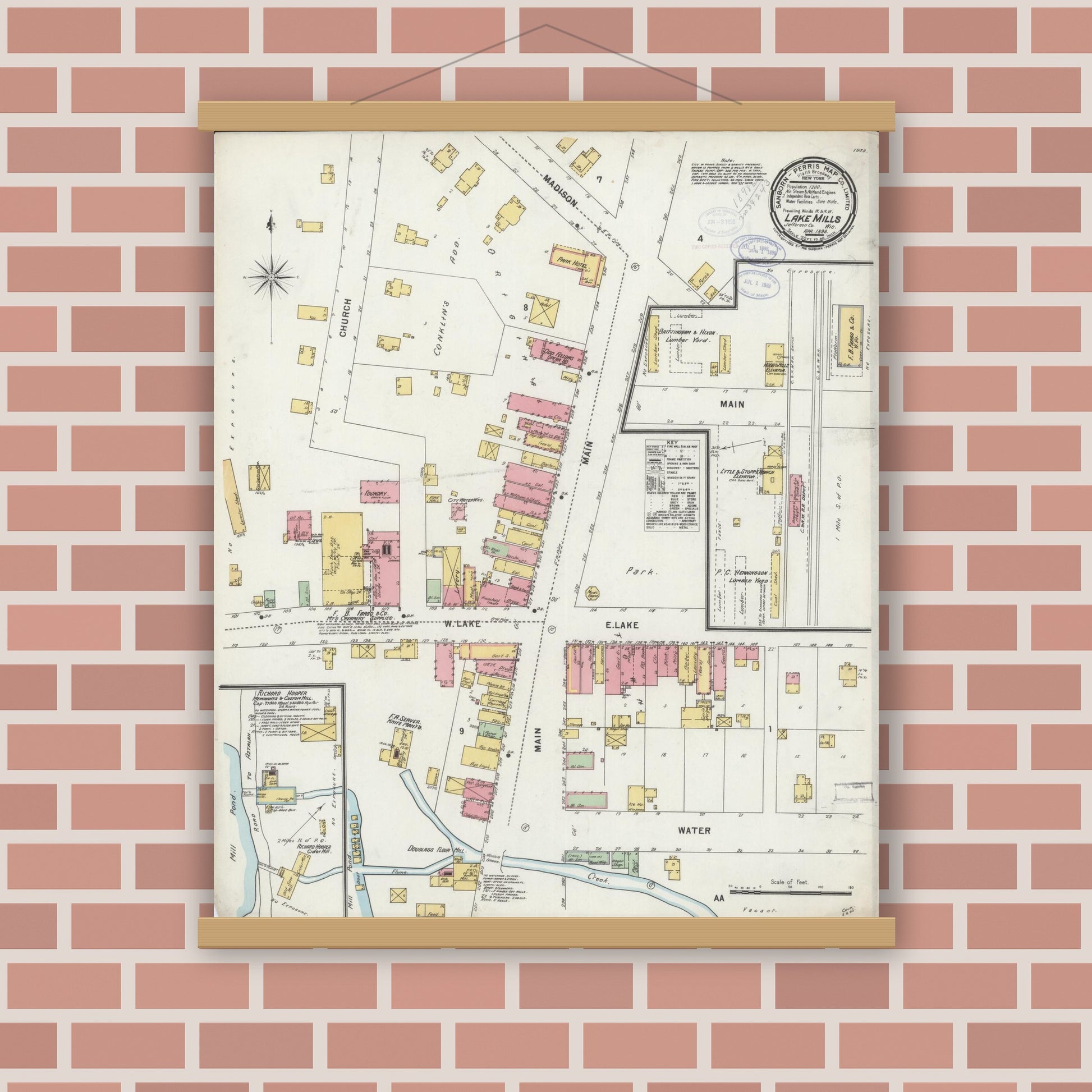 Old map wall art mockup — magnetic wood frame on brick wall — Sanborn Fire Insurance Map from Lake Mills, Jefferson County, Wisconsin (1898), Sheet #0001