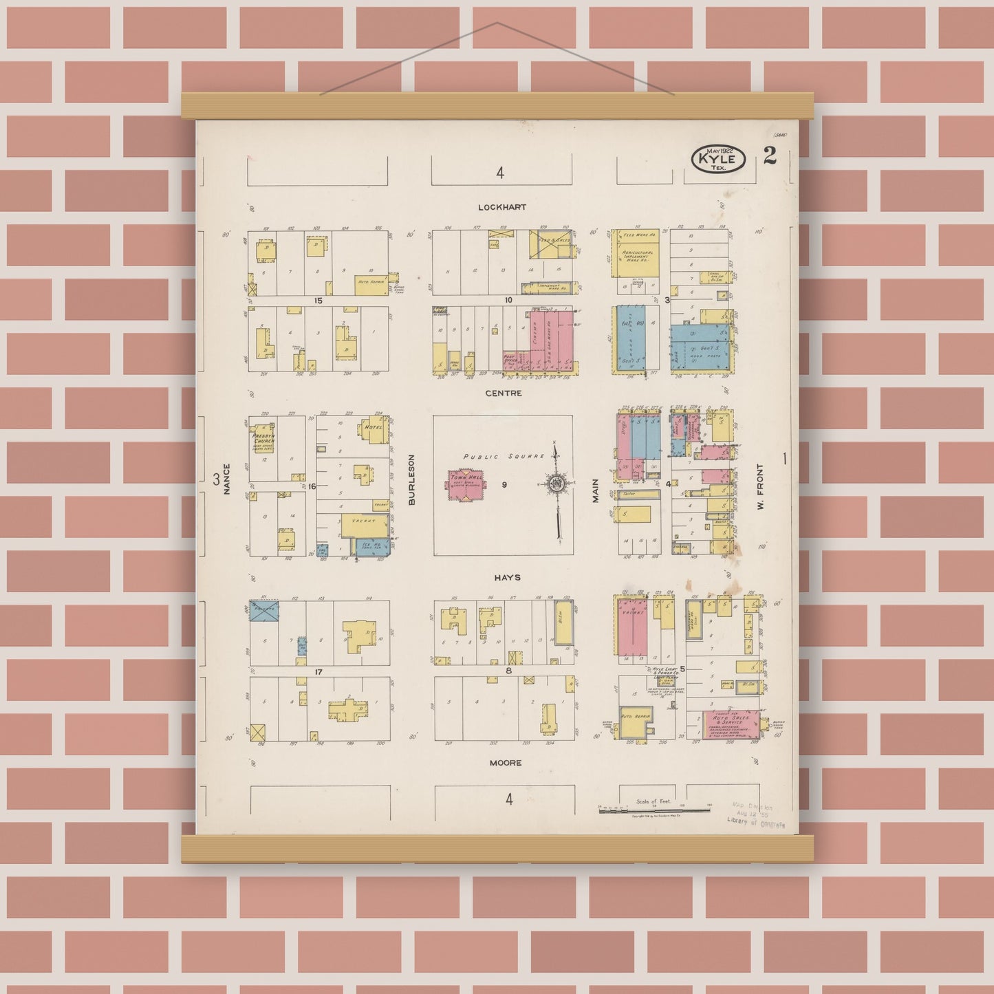Old map wall art mockup — magnetic wood frame on brick wall — Sanborn Fire Insurance Map from Kyle, Hays County, Texas (1922), Sheet #0002