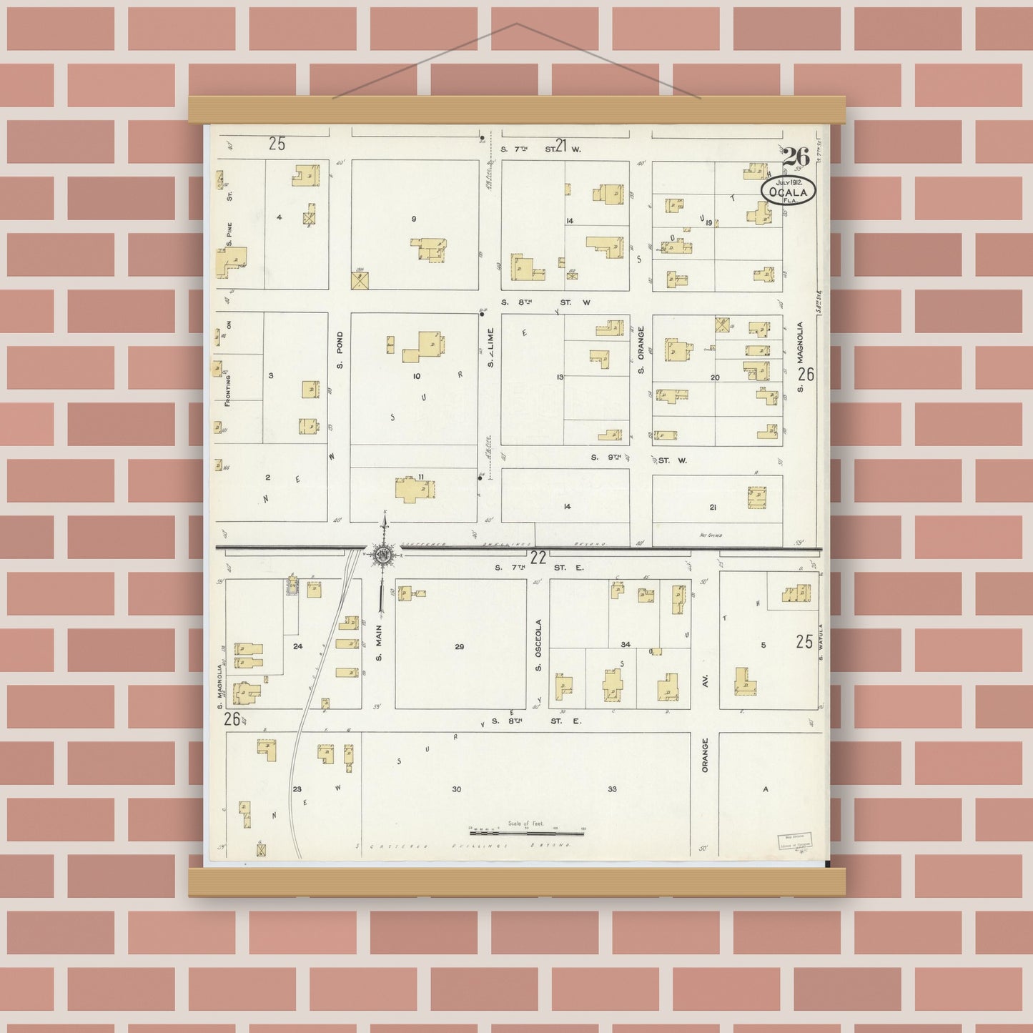 Old map wall art mockup — magnetic wood frame on brick wall — Sanborn Fire Insurance Map from Ocala, Marion County, Florida (1912), Sheet #0026