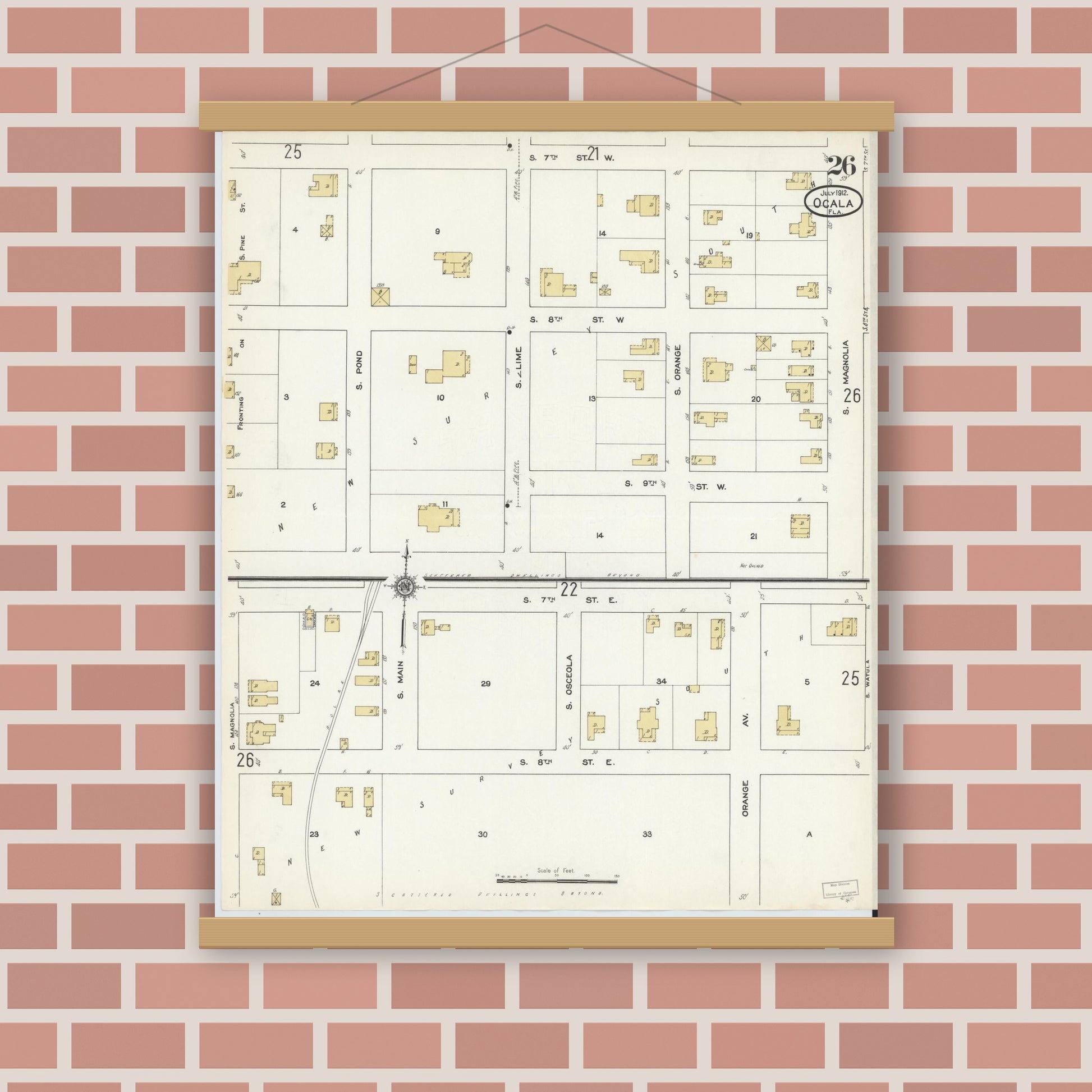 Old map wall art mockup — magnetic wood frame on brick wall — Sanborn Fire Insurance Map from Ocala, Marion County, Florida (1912), Sheet #0026