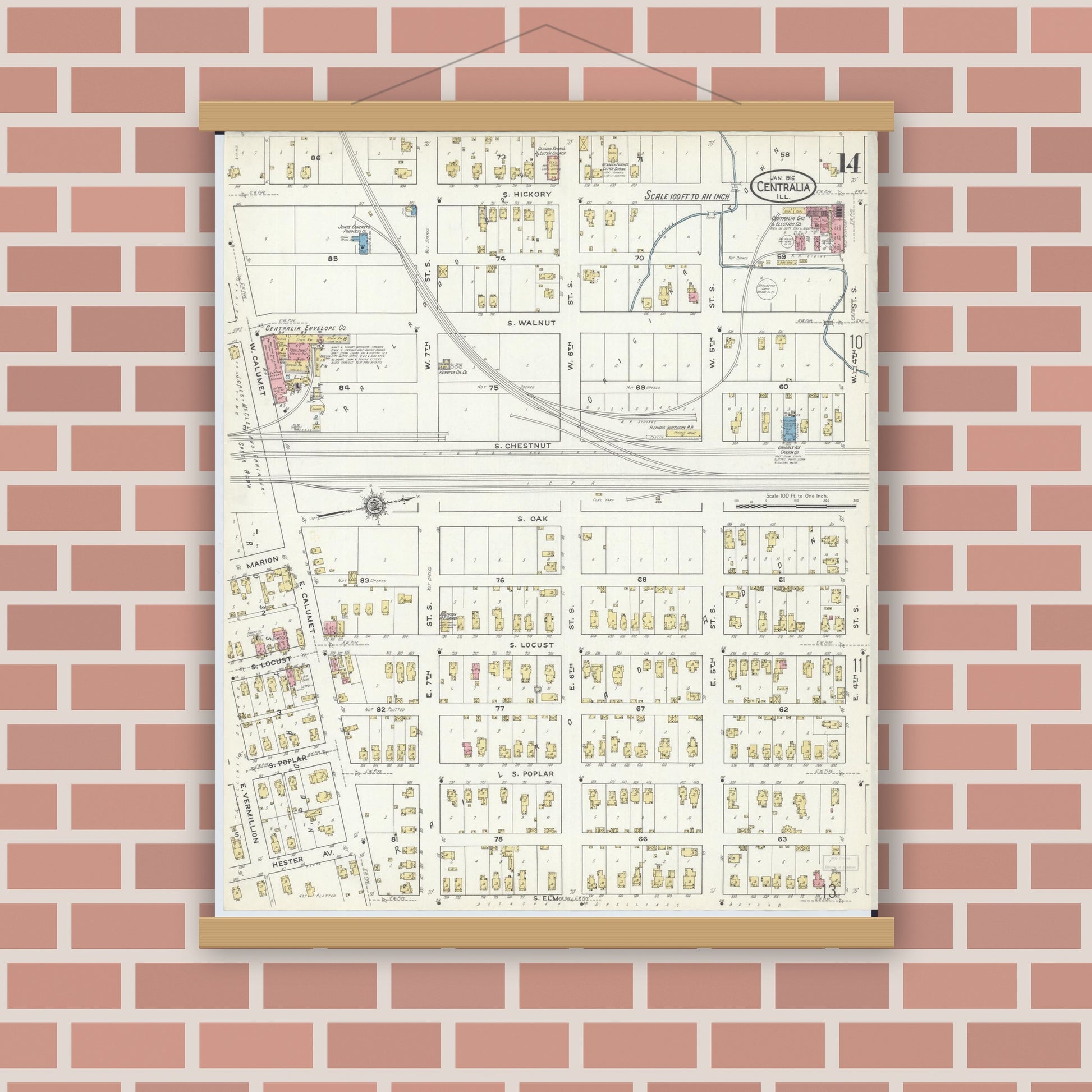 Old map wall art mockup — magnetic wood frame on brick wall — Sanborn Fire Insurance Map from Centralia, Marion, Clinton, Jefferson, and Washington Counties, Illinois (1916), Sheet #0014