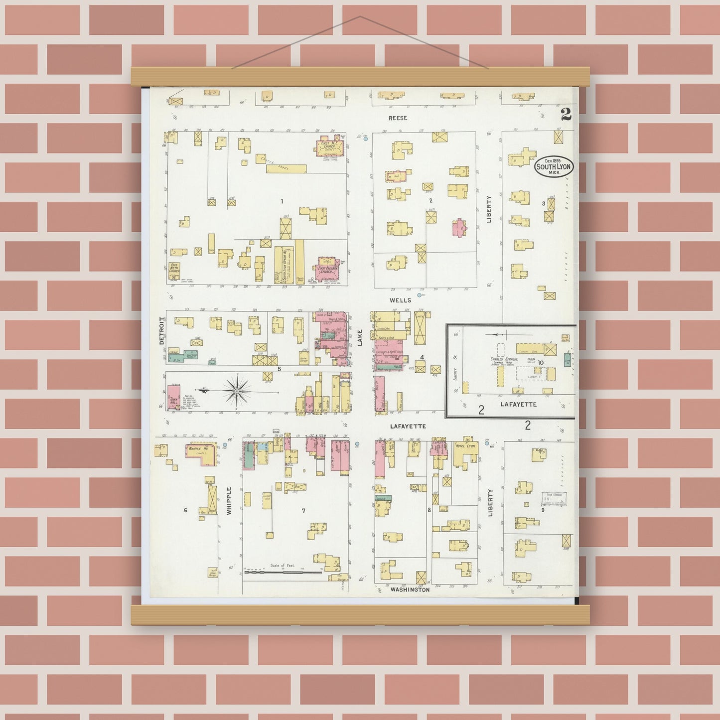 Old map wall art mockup — magnetic wood frame on brick wall — Sanborn Fire Insurance Map from South Lyon, Oakland County, Michigan (1899), Sheet #0002