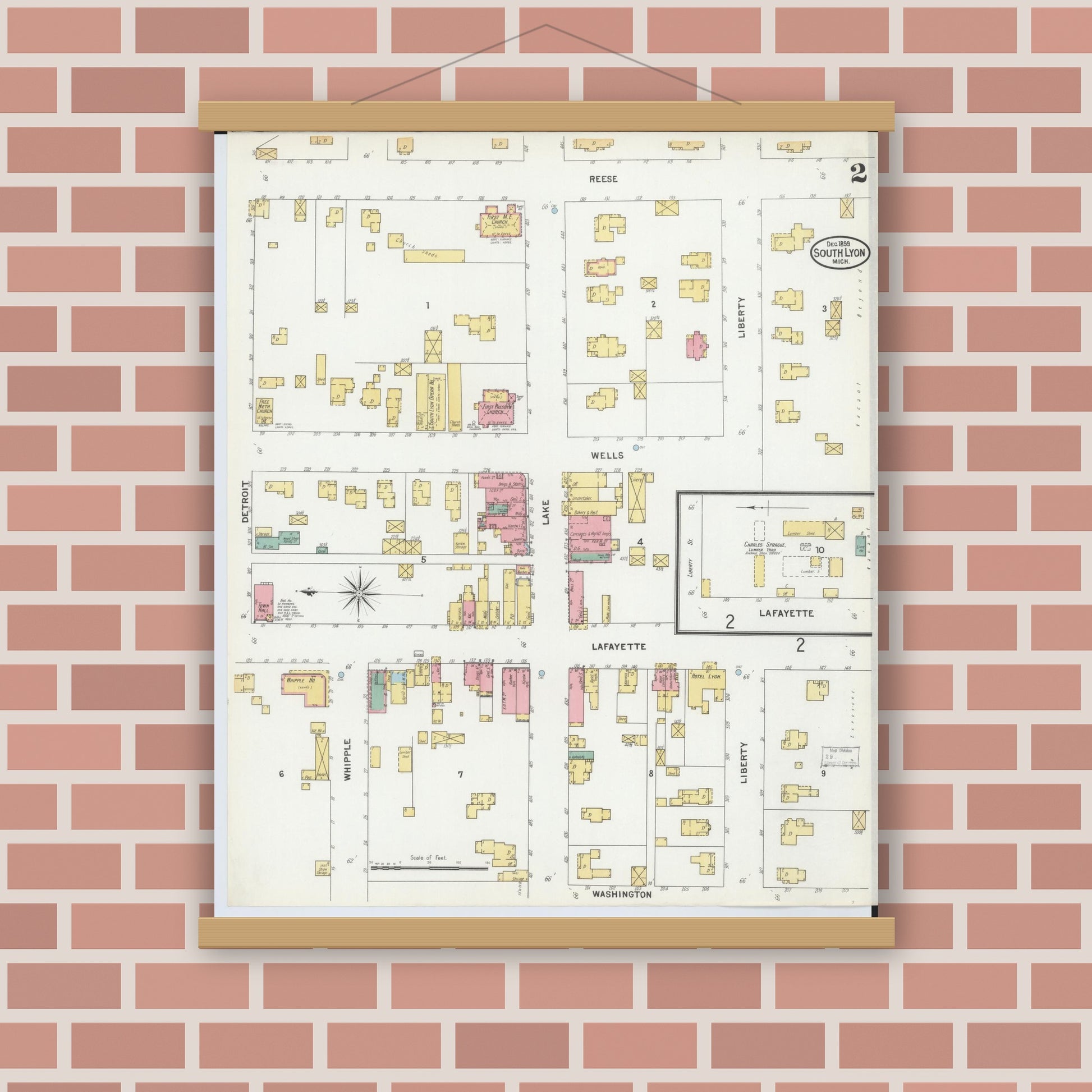 Old map wall art mockup — magnetic wood frame on brick wall — Sanborn Fire Insurance Map from South Lyon, Oakland County, Michigan (1899), Sheet #0002