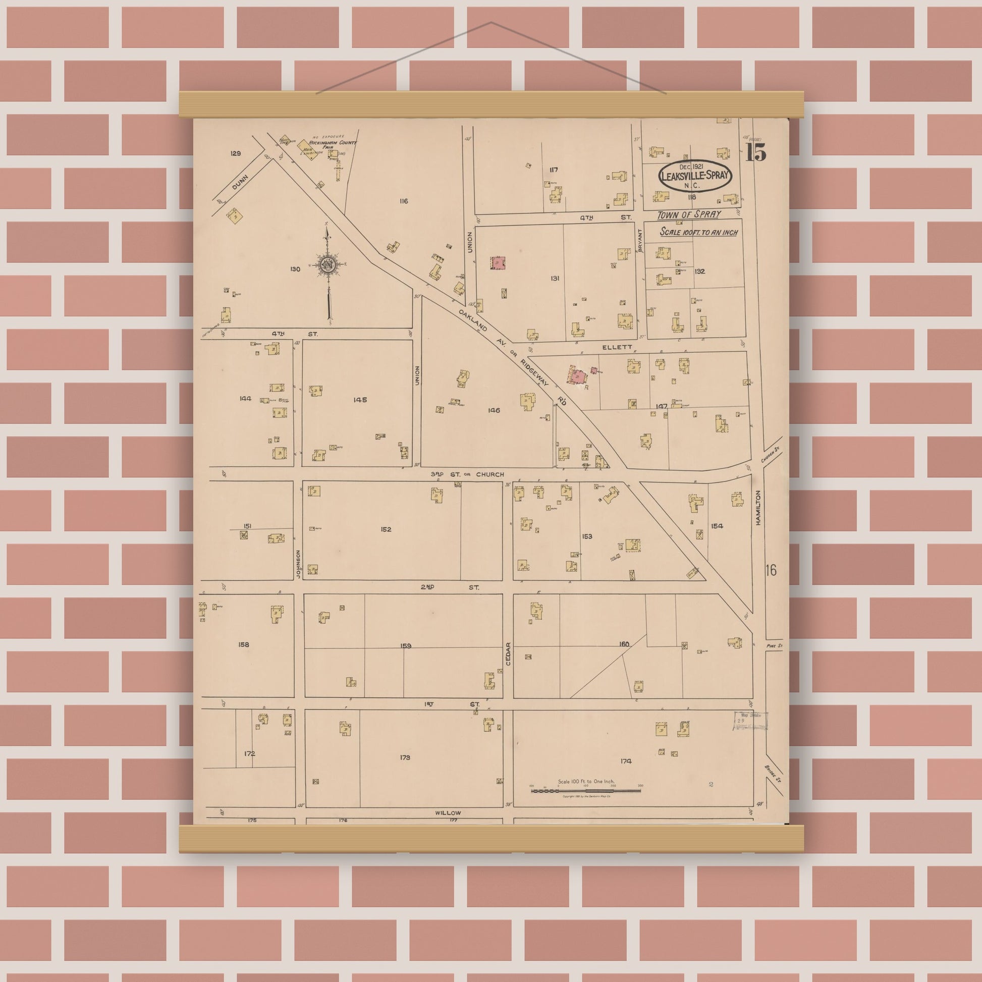 Old map wall art mockup — magnetic wood frame on brick wall — Sanborn Fire Insurance Map from Leaksville-spray, Rockingham County, North Carolina (1921), Sheet #0015