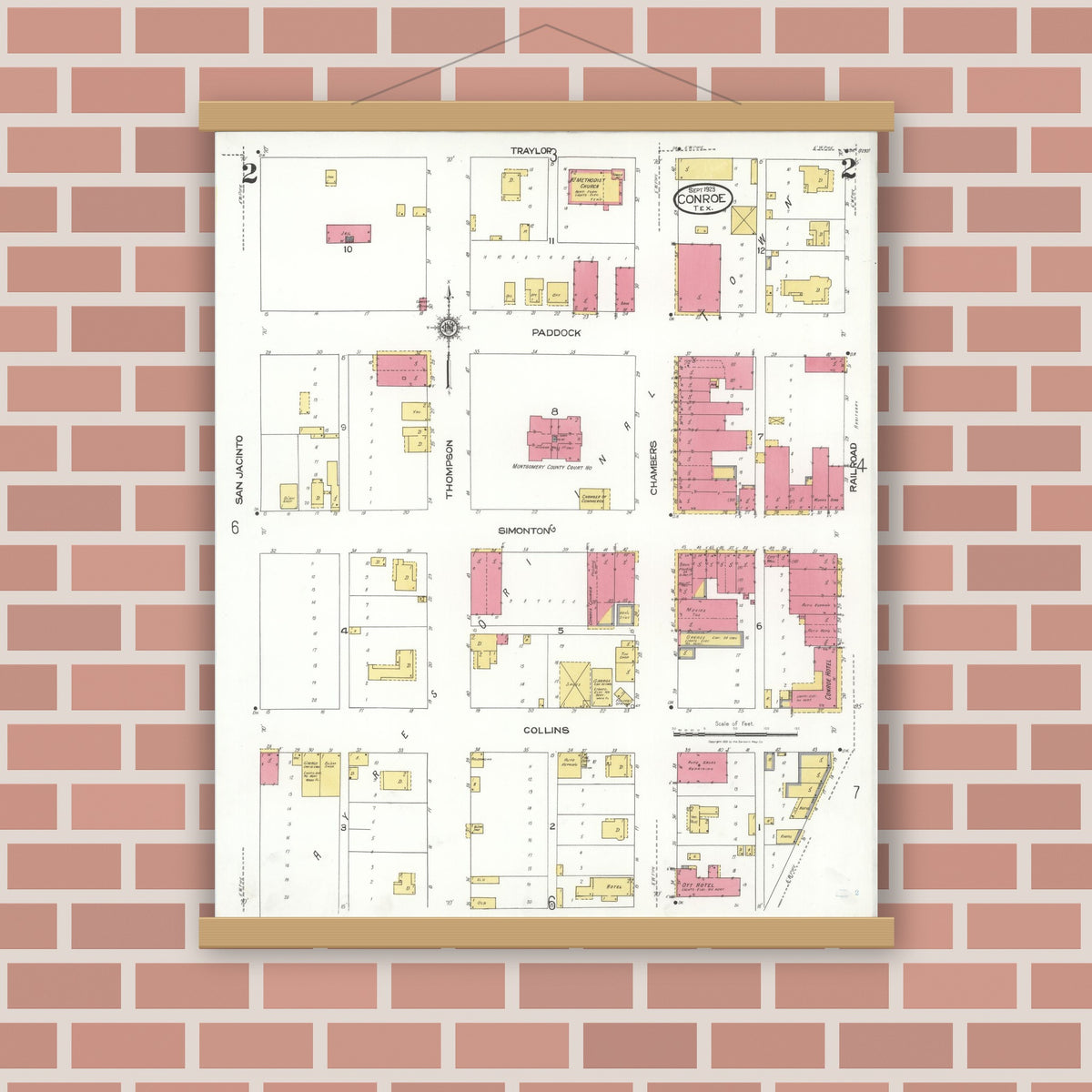 Old map wall art mockup — magnetic wood frame on brick wall — Sanborn Fire Insurance Map from Conroe, Montgomery County, Texas (1923), Sheet #0002