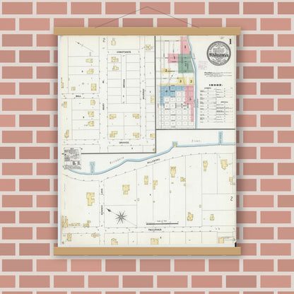 Old map wall art mockup — magnetic wood frame on brick wall — Sanborn Fire Insurance Map from New Smyrna, Valusia County, Florida (1906), Sheet #0001