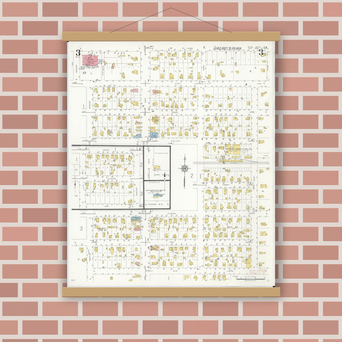 Old map wall art mockup — magnetic wood frame on brick wall — Sanborn Fire Insurance Map from Ovid, Clinton County, Michigan (1934), Sheet #0003