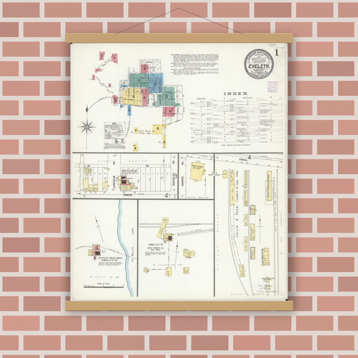 Old map wall art mockup — magnetic wood frame on brick wall — Sanborn Fire Insurance Map from Eveleth, Saint Louis County, Minnesota (1906), Sheet #0001