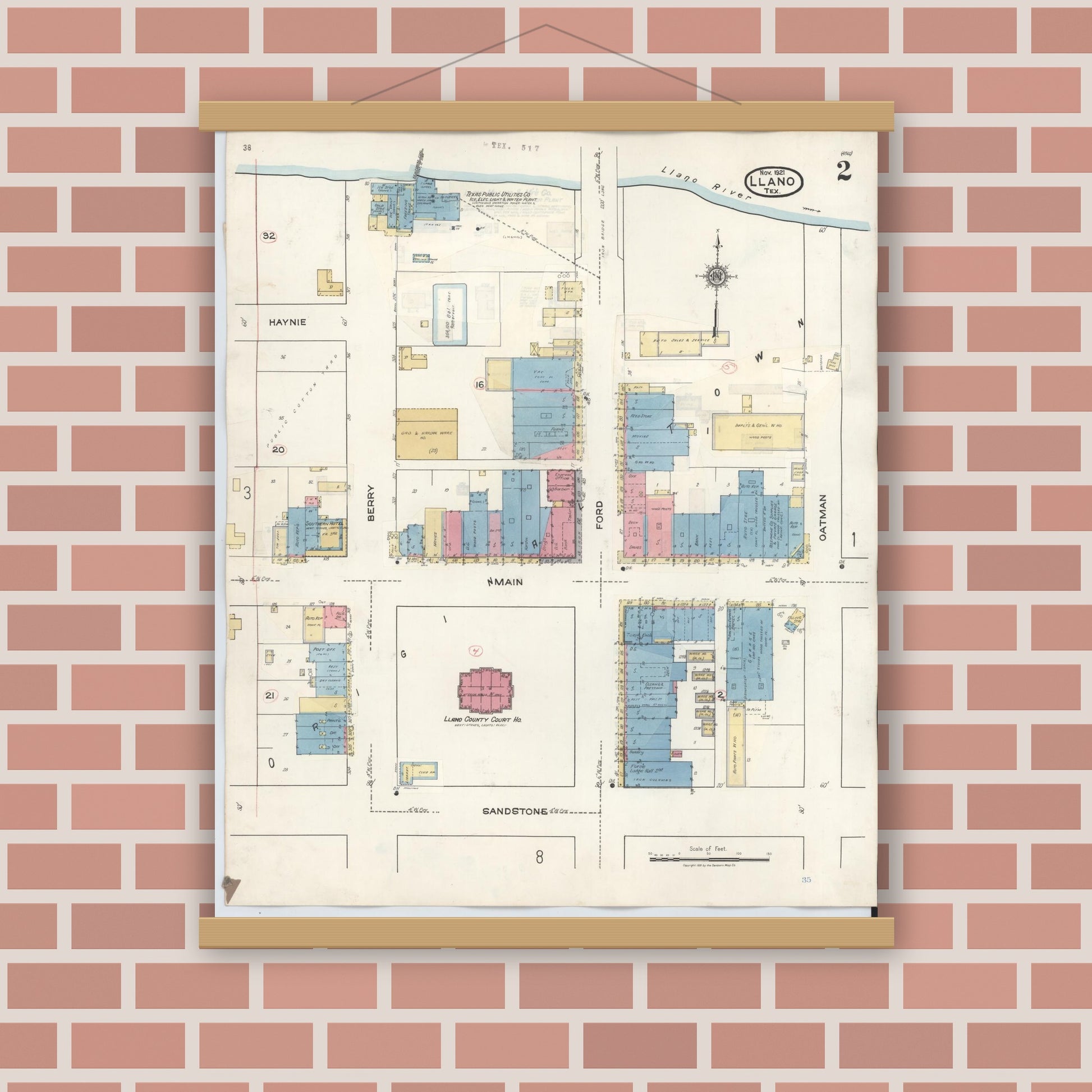Old map wall art mockup — magnetic wood frame on brick wall — Sanborn Fire Insurance Map from Llano, Llano County, Texas (1942), Sheet #0002
