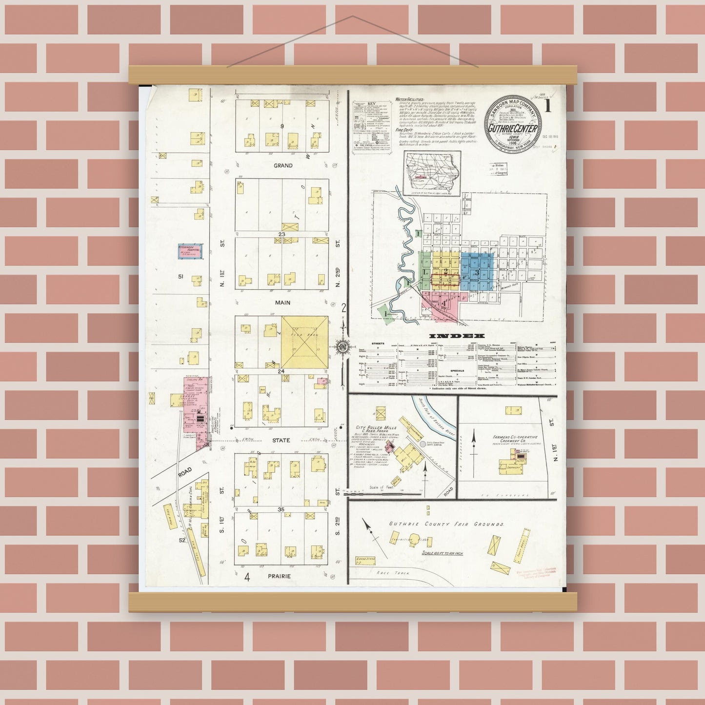 Old map wall art mockup — magnetic wood frame on brick wall — Sanborn Fire Insurance Map from Guthrie Center, Guthrie County, Iowa (1916) â€” Complete Set