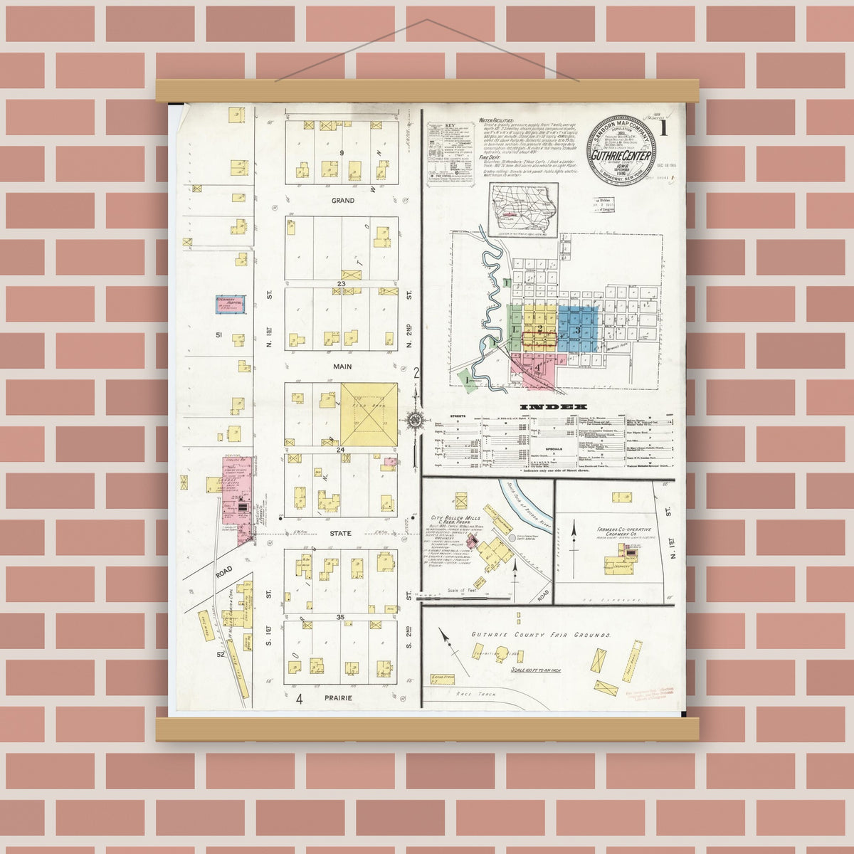 Old map wall art mockup — magnetic wood frame on brick wall — Sanborn Fire Insurance Map from Guthrie Center, Guthrie County, Iowa (1916) â€” Complete Set