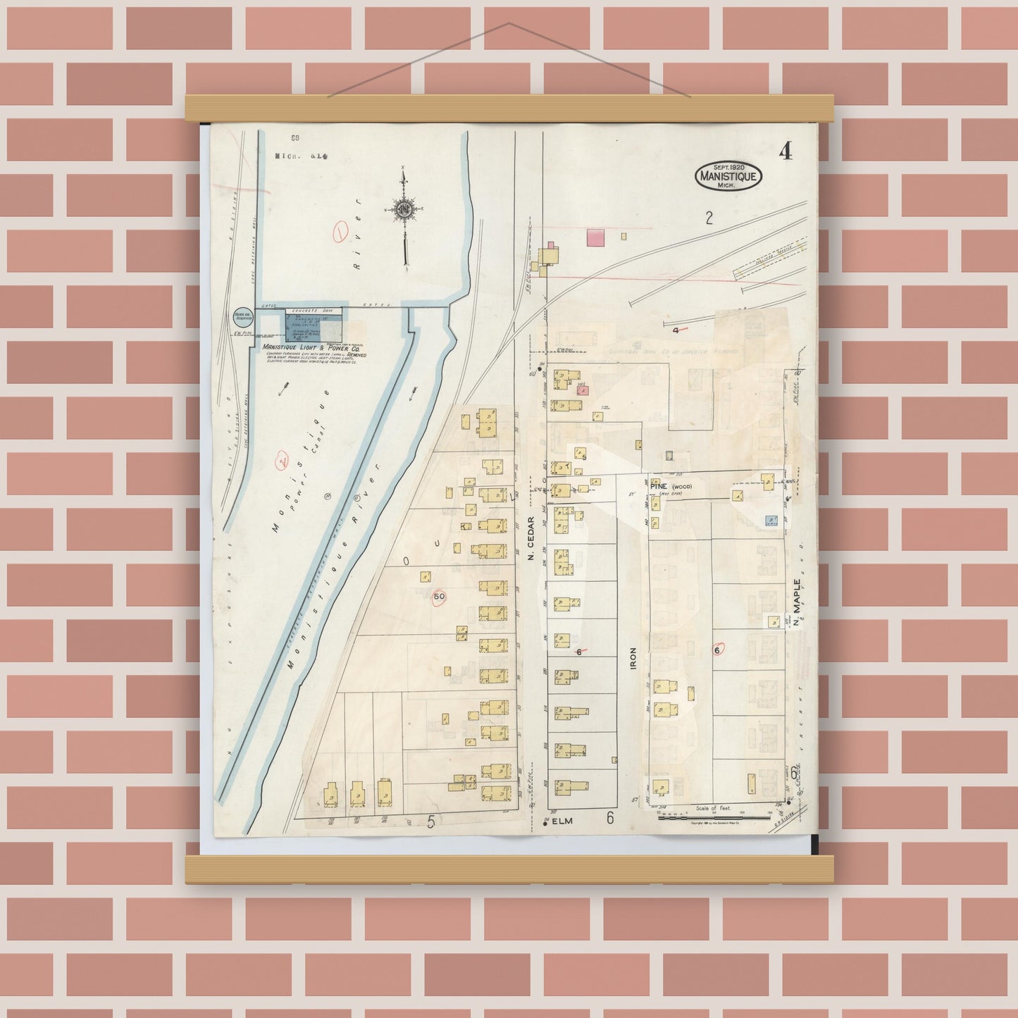 Old map wall art mockup — magnetic wood frame on brick wall — Sanborn Fire Insurance Map from Manistique, Schoolcraft County, Michigan (1950), Sheet #0004