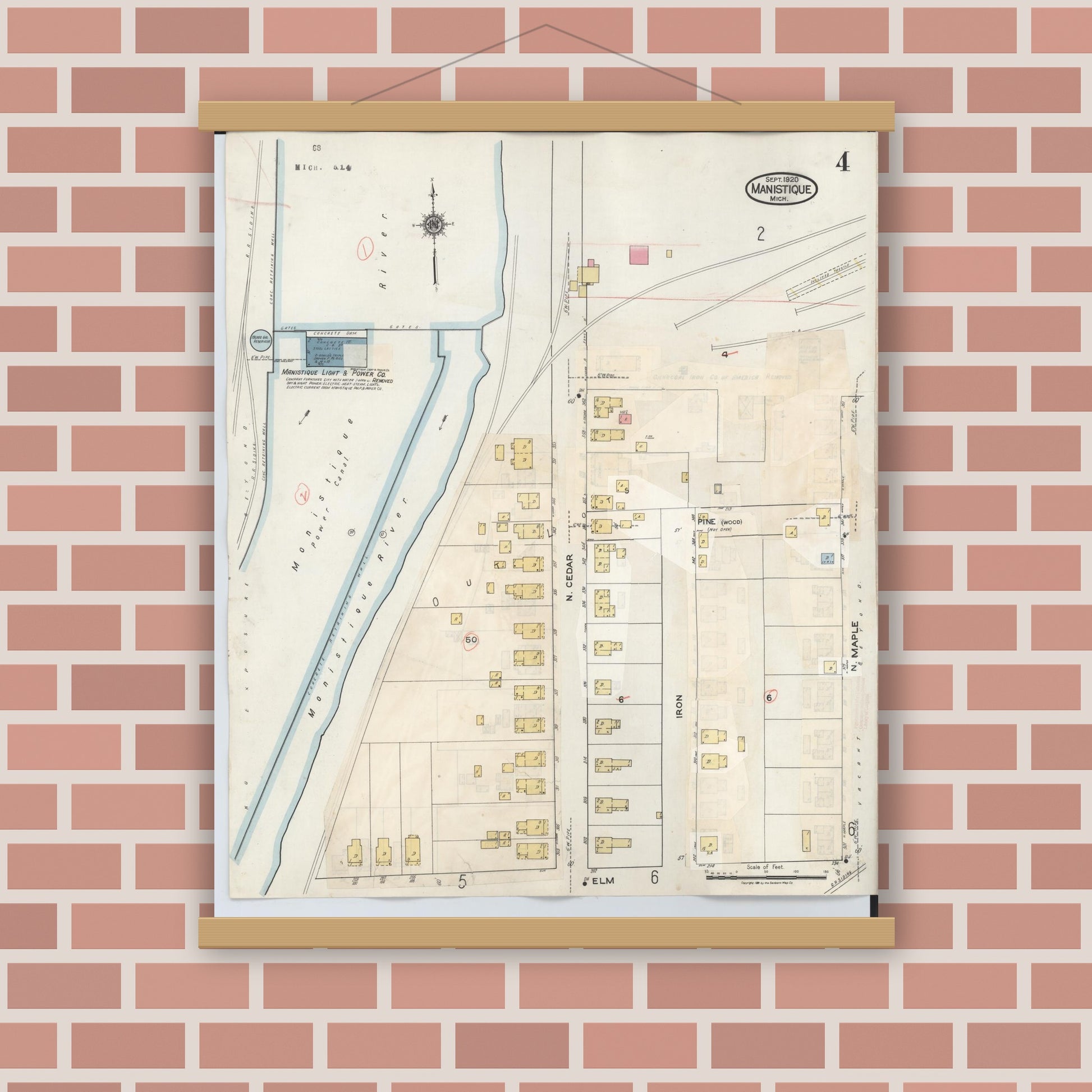 Old map wall art mockup — magnetic wood frame on brick wall — Sanborn Fire Insurance Map from Manistique, Schoolcraft County, Michigan (1950), Sheet #0004