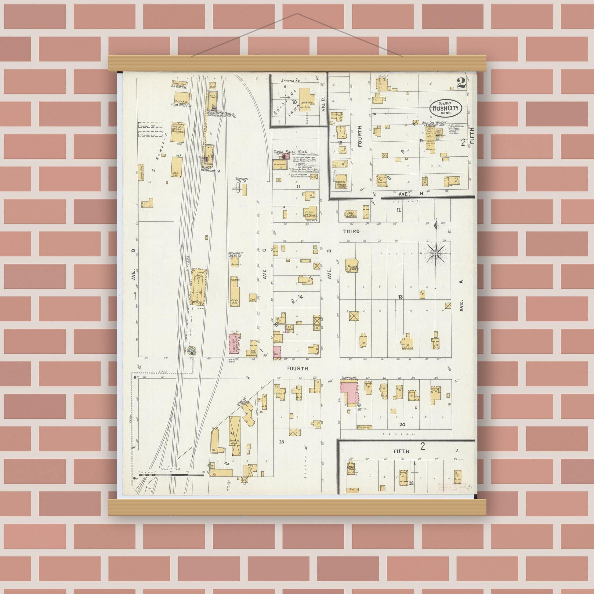 Old map wall art mockup — magnetic wood frame on brick wall — Sanborn Fire Insurance Map from Rush City, Chisago County, Minnesota (1899), Sheet #0002