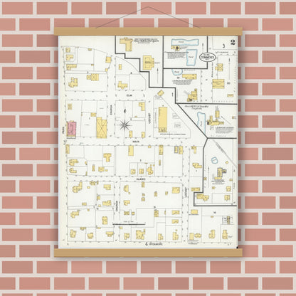 Old map wall art mockup — magnetic wood frame on brick wall — Sanborn Fire Insurance Map from Commerce, Hunt County, Texas (1901), Sheet #0002