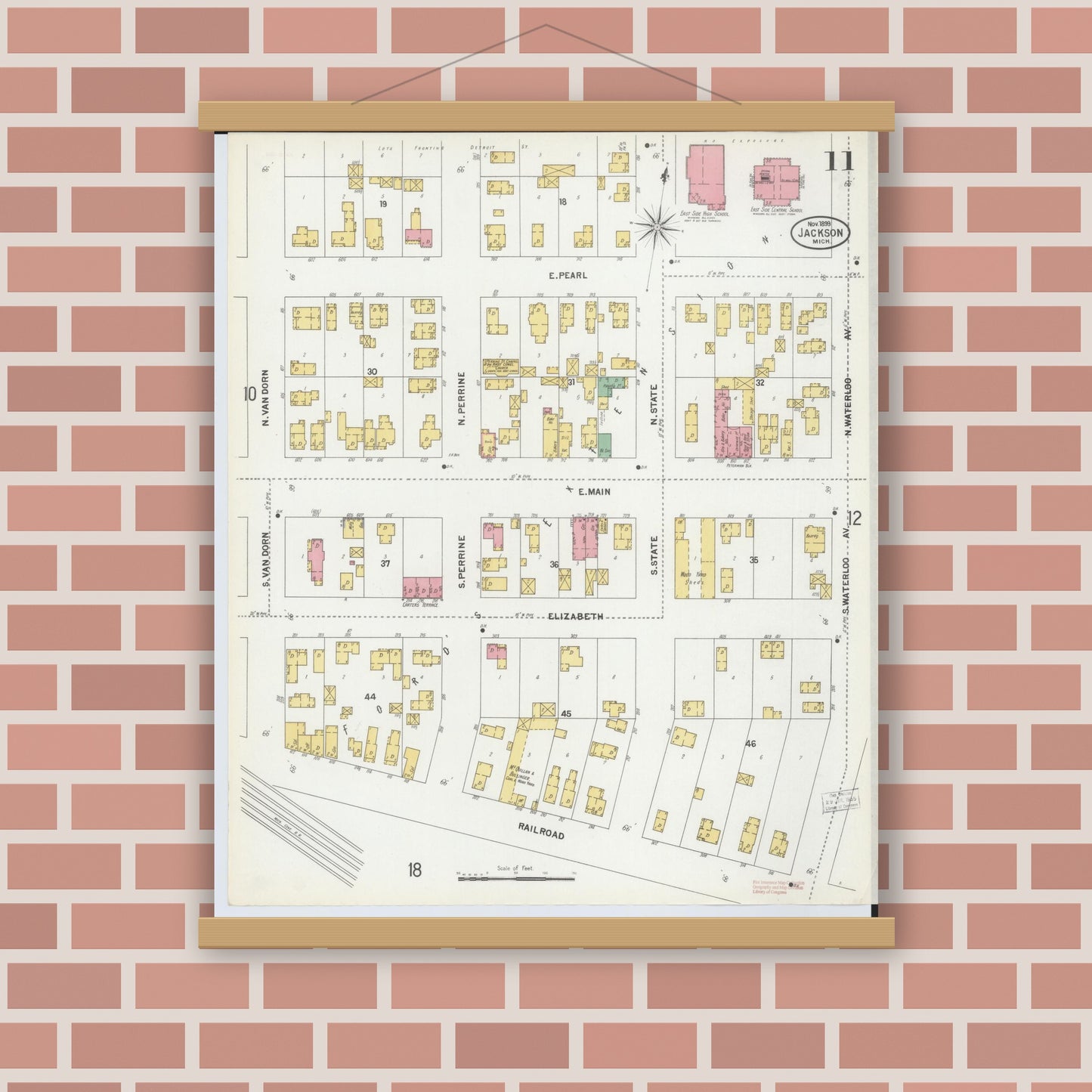 Old map wall art mockup — magnetic wood frame on brick wall — Sanborn Fire Insurance Map from Jackson, Jackson County, Michigan (1899), Sheet #0011
