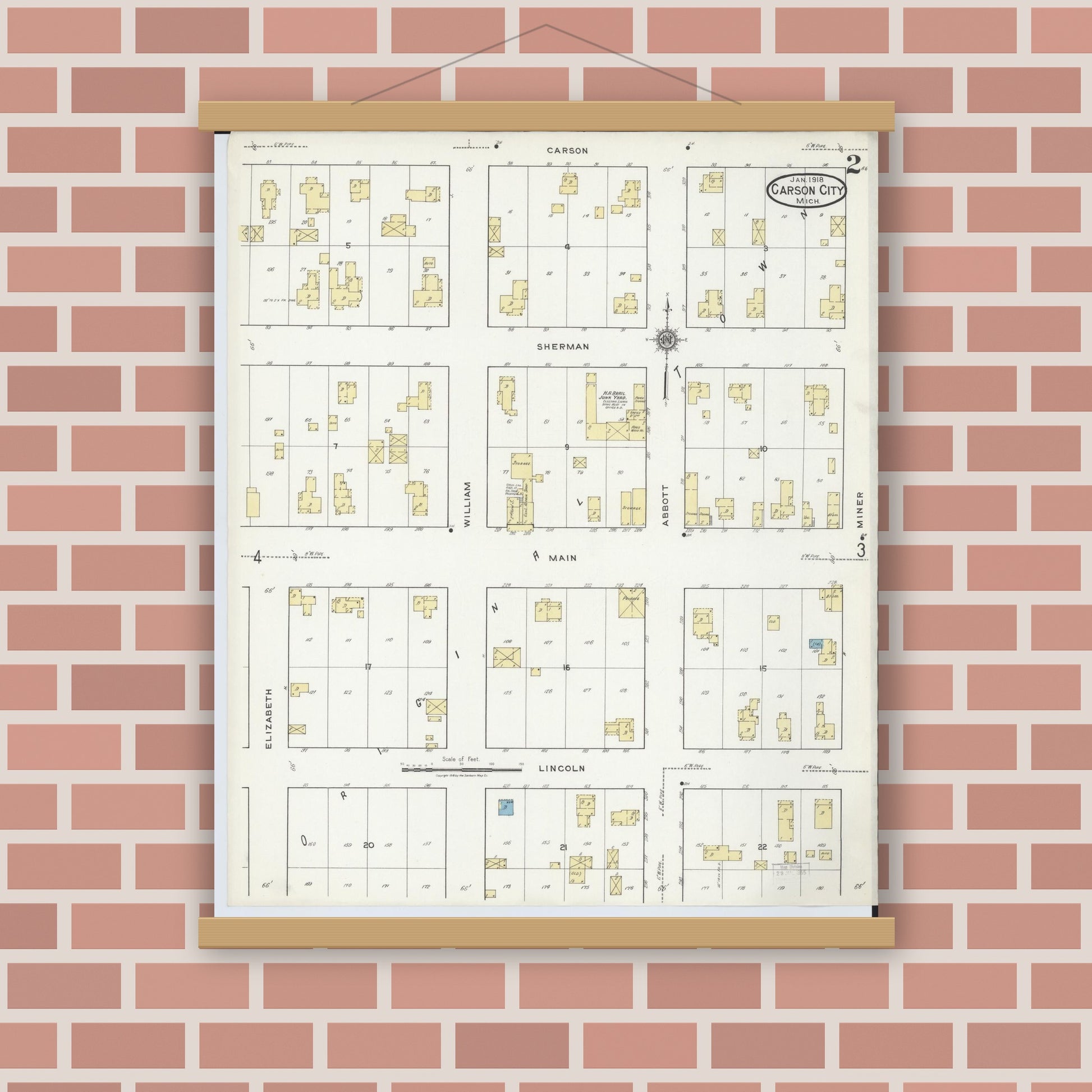 Old map wall art mockup — magnetic wood frame on brick wall — Sanborn Fire Insurance Map from Carson City, Montcalm County, Michigan (1918), Sheet #0002