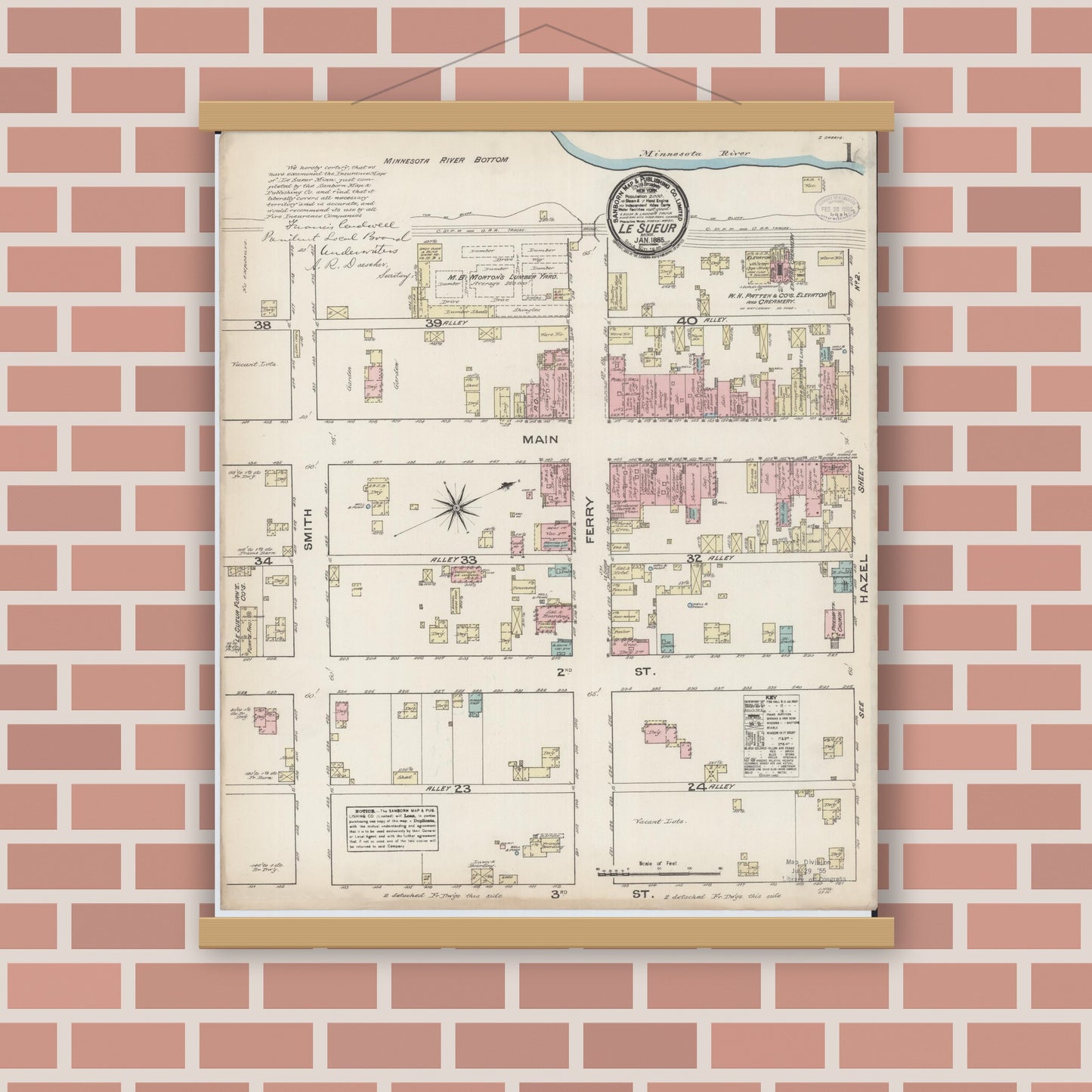 Old map wall art mockup — magnetic wood frame on brick wall — Sanborn Fire Insurance Map from Le Sueur, Le Sueur County, Minnesota (1885), Sheet #0001
