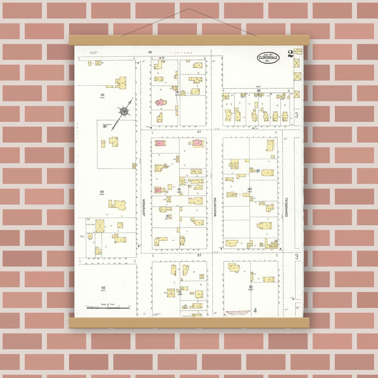 Old map wall art mockup — magnetic wood frame on brick wall — Sanborn Fire Insurance Map from Cloverdale, Sonoma County, California (1911), Sheet #0002