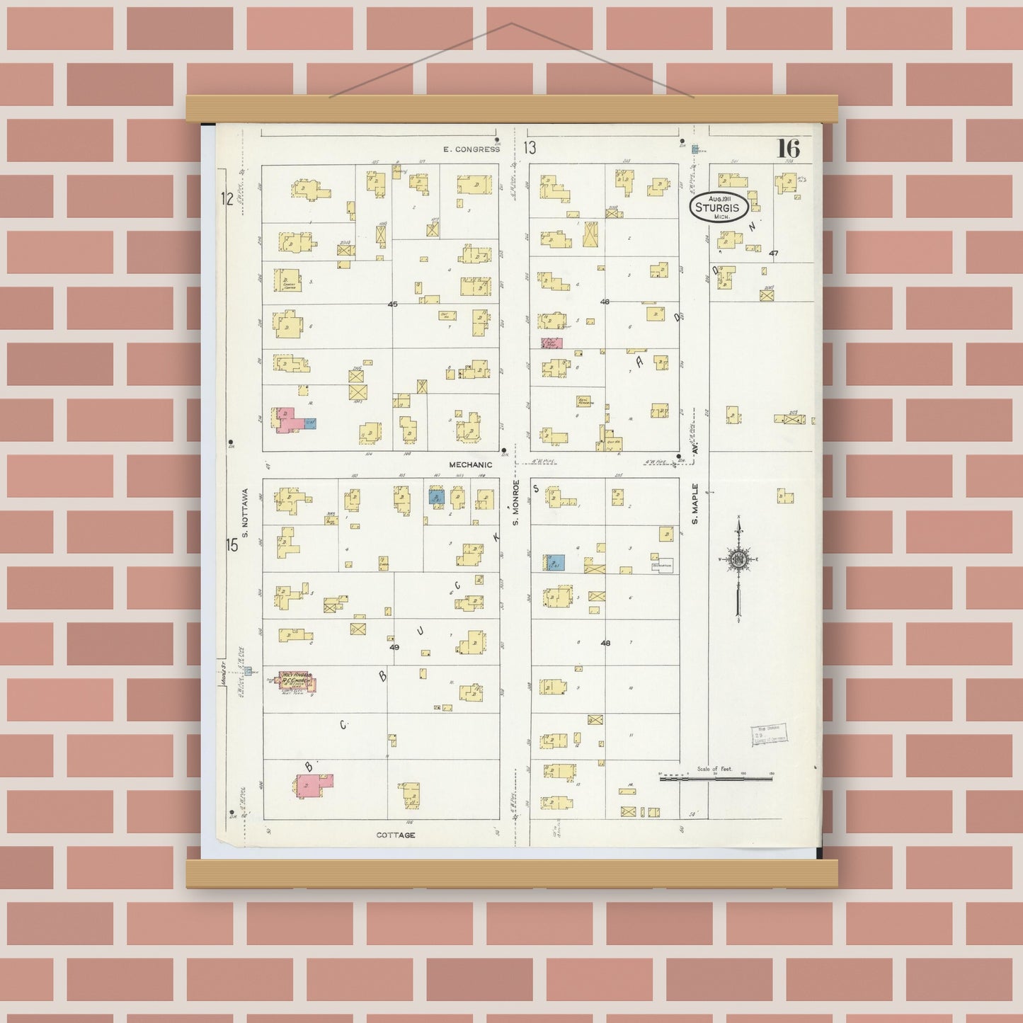 Old map wall art mockup — magnetic wood frame on brick wall — Sanborn Fire Insurance Map from Sturgis, Saint Joseph County, Michigan (1911), Sheet #0016