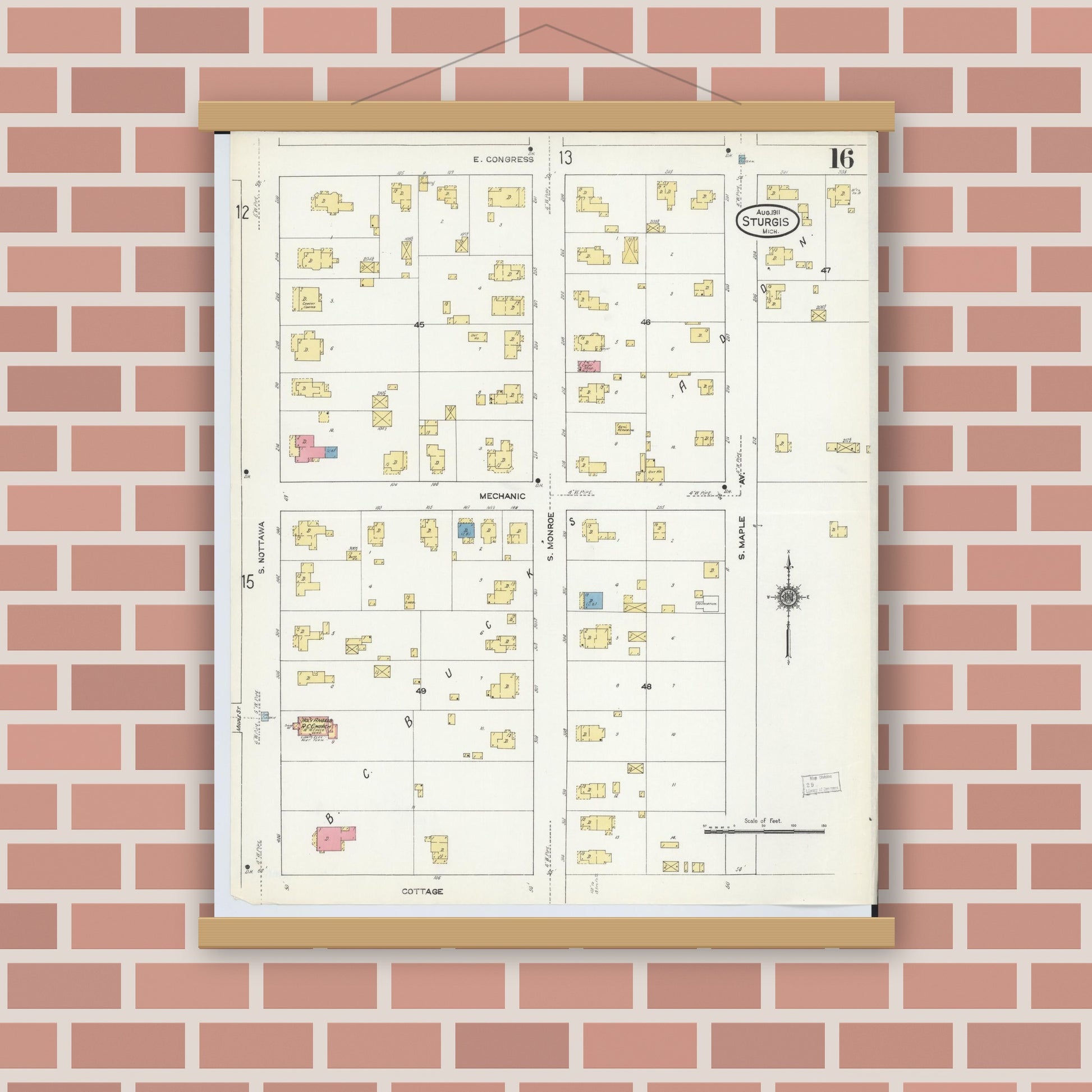 Old map wall art mockup — magnetic wood frame on brick wall — Sanborn Fire Insurance Map from Sturgis, Saint Joseph County, Michigan (1911), Sheet #0016