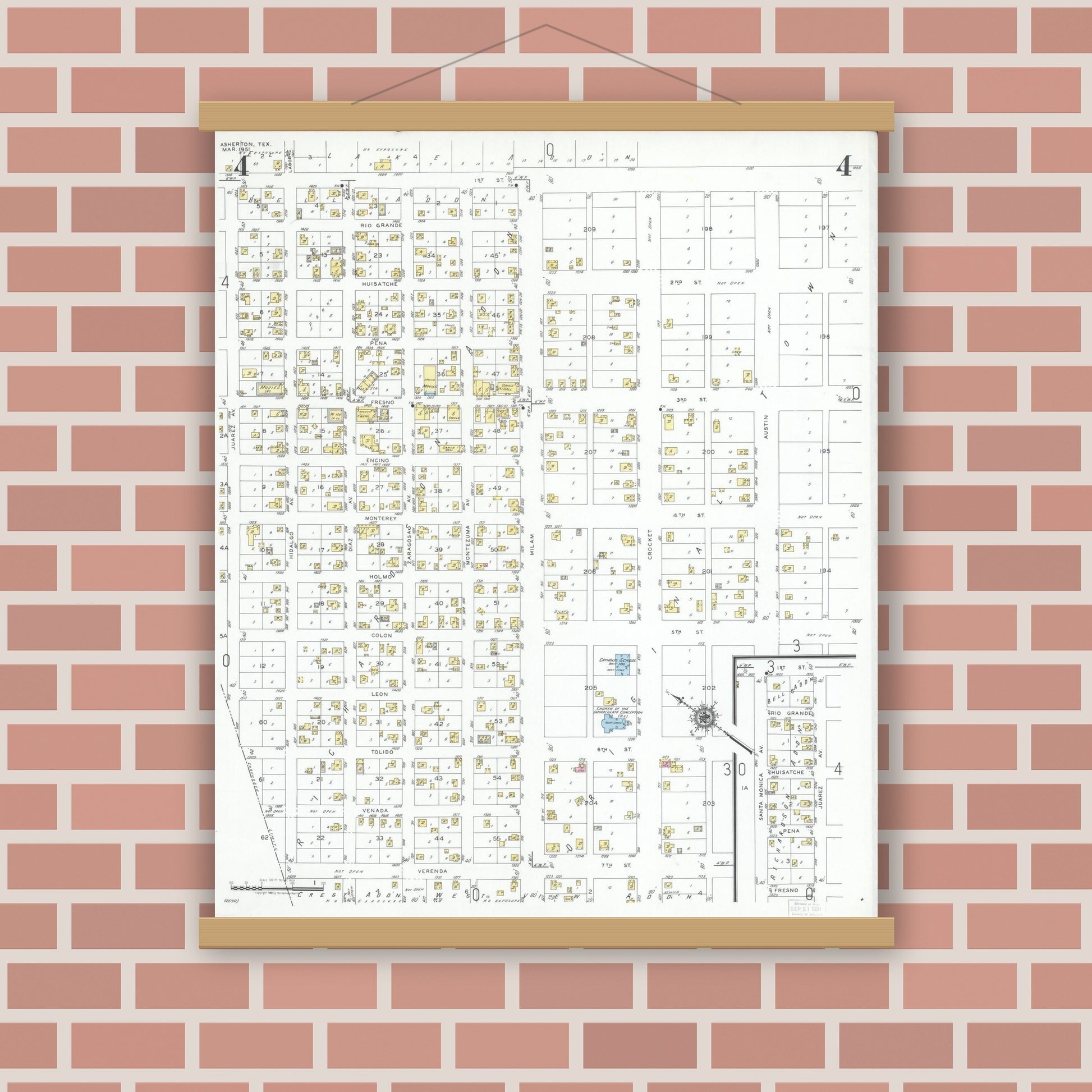 Old map wall art mockup — magnetic wood frame on brick wall — Sanborn Fire Insurance Map from Asherton, Dimmit County, Texas (1951), Sheet #0004