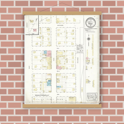 Old map wall art mockup — magnetic wood frame on brick wall — Sanborn Fire Insurance Map from Yale, Guthrie County, Iowa (1914), Sheet #0001