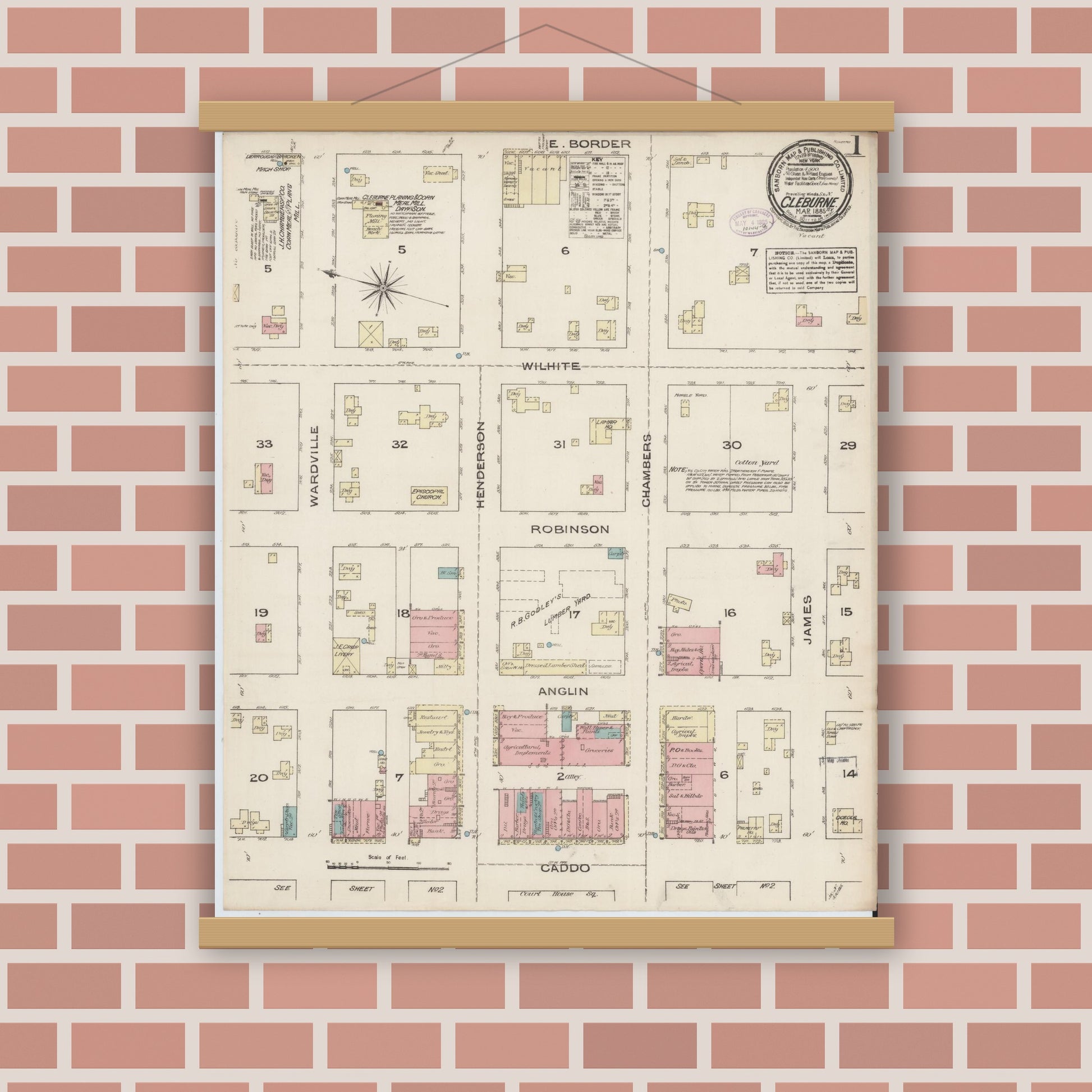 Old map wall art mockup — magnetic wood frame on brick wall — Sanborn Fire Insurance Map from Cleburne, Johnson County, Texas (1885), Sheet #0001