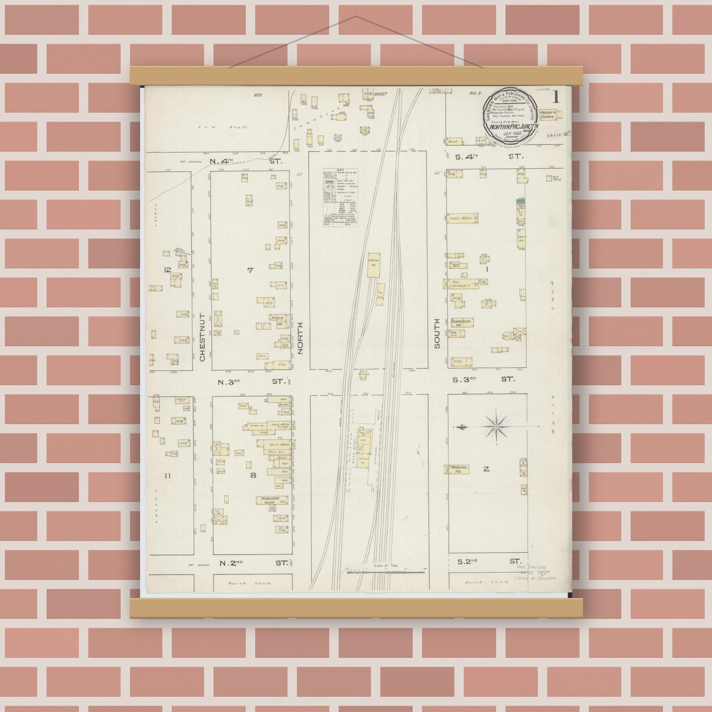 Old map wall art mockup — magnetic wood frame on brick wall — Sanborn Fire Insurance Map from Northern Pacific Junction, Carlton County, Minnesota (1885) - Complete Map Set