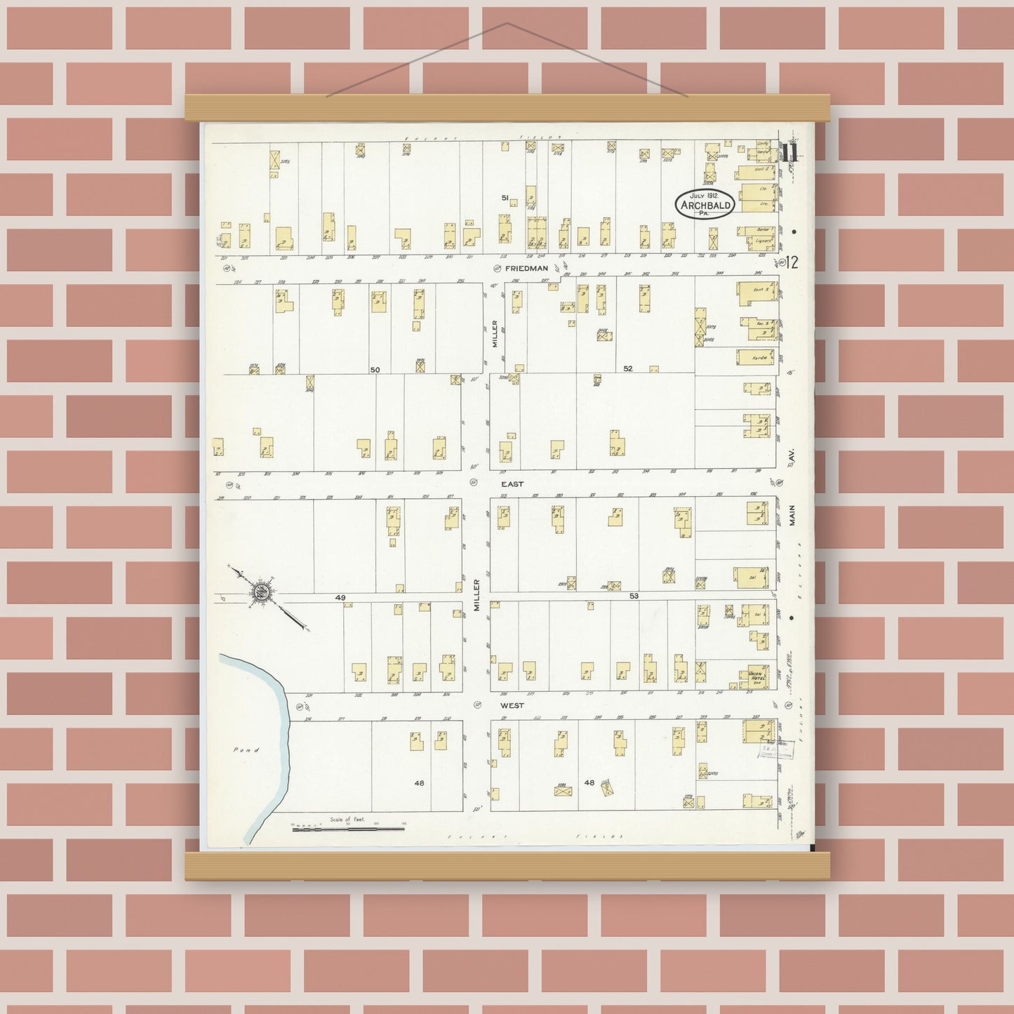 Old map wall art mockup — magnetic wood frame on brick wall — Sanborn Fire Insurance Map from Archbald, Lackawanna County, Pennsylvania (1912), Sheet #0011