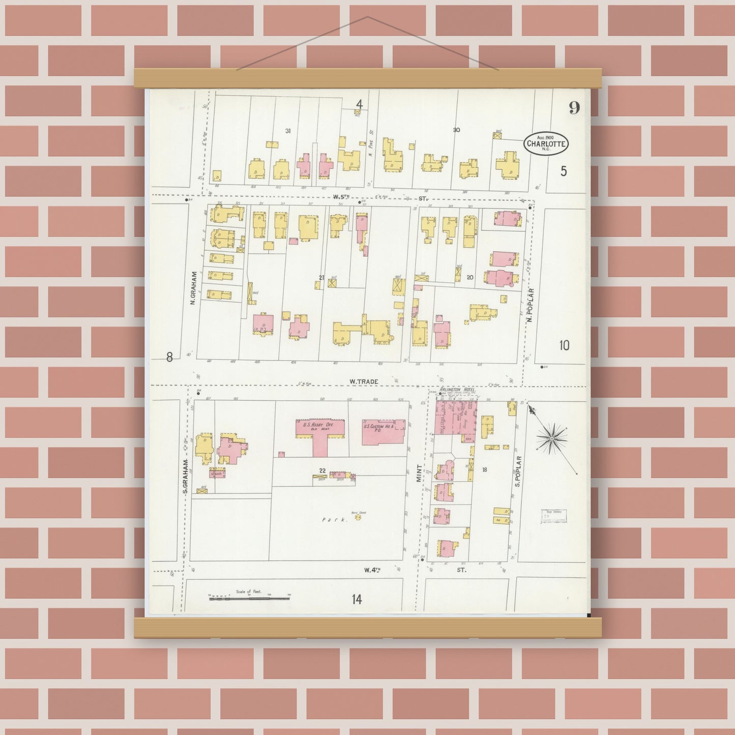 Old map wall art mockup — magnetic wood frame on brick wall — Sanborn Fire Insurance Map from Charlotte, Mecklenburg County, North Carolina (1900), Sheet #0009